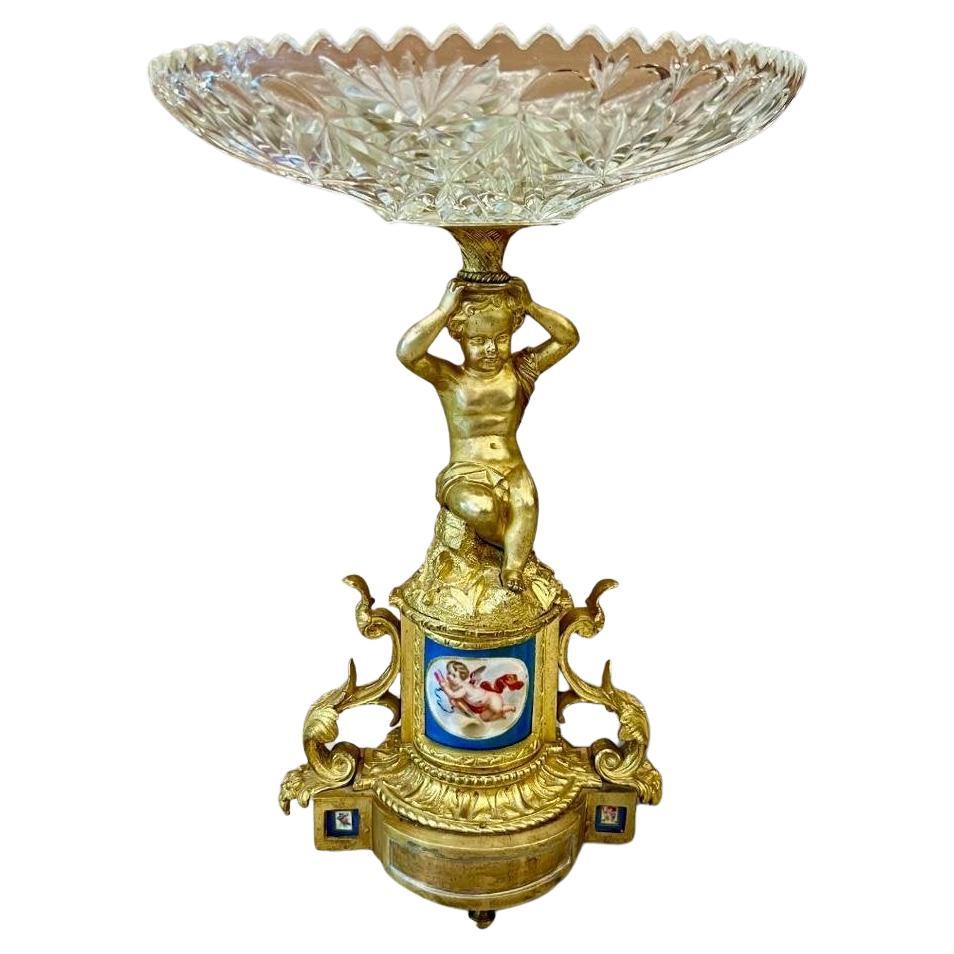 19th Century Cut Crystal Bowl on a Gilt Bronze Pedestal with Putti Motifs For Sale