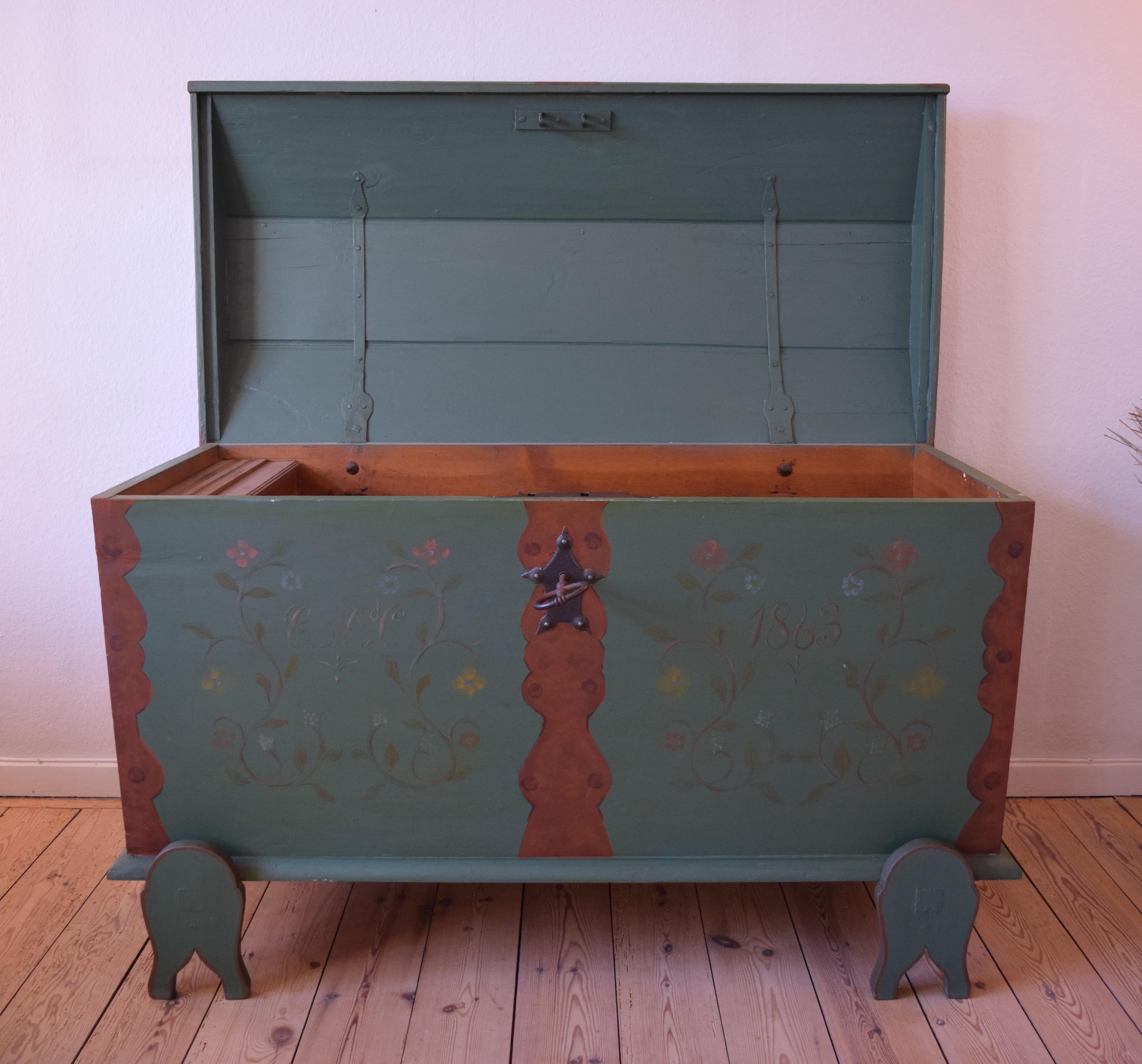 Large Danish 19th century dowry chest. On the front it is marked with the owner's initials, and the year 1863 with flowers in the background. The floral design represents the 