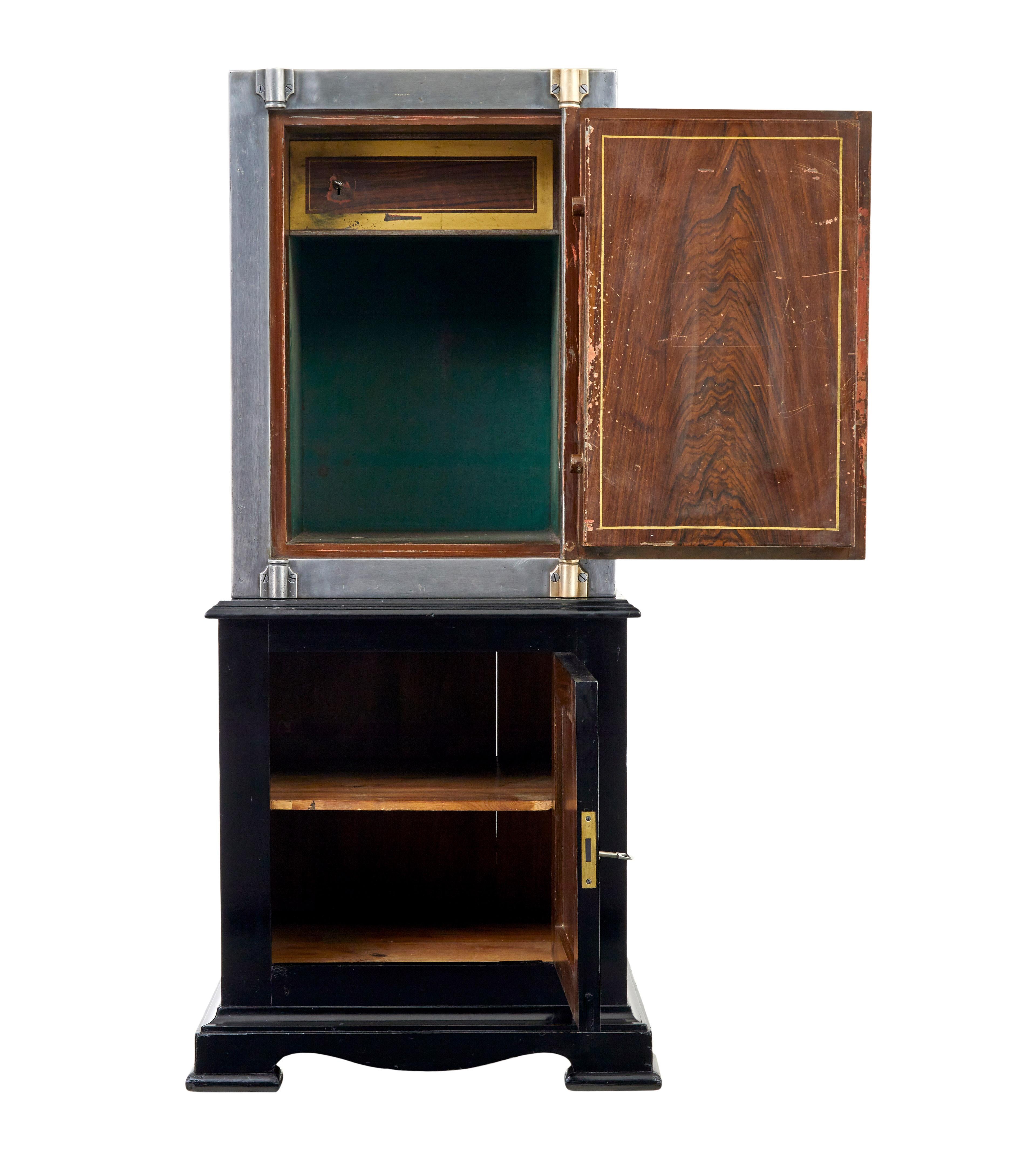 Ebonized 19th century Danish polished steel safe on cabinet For Sale