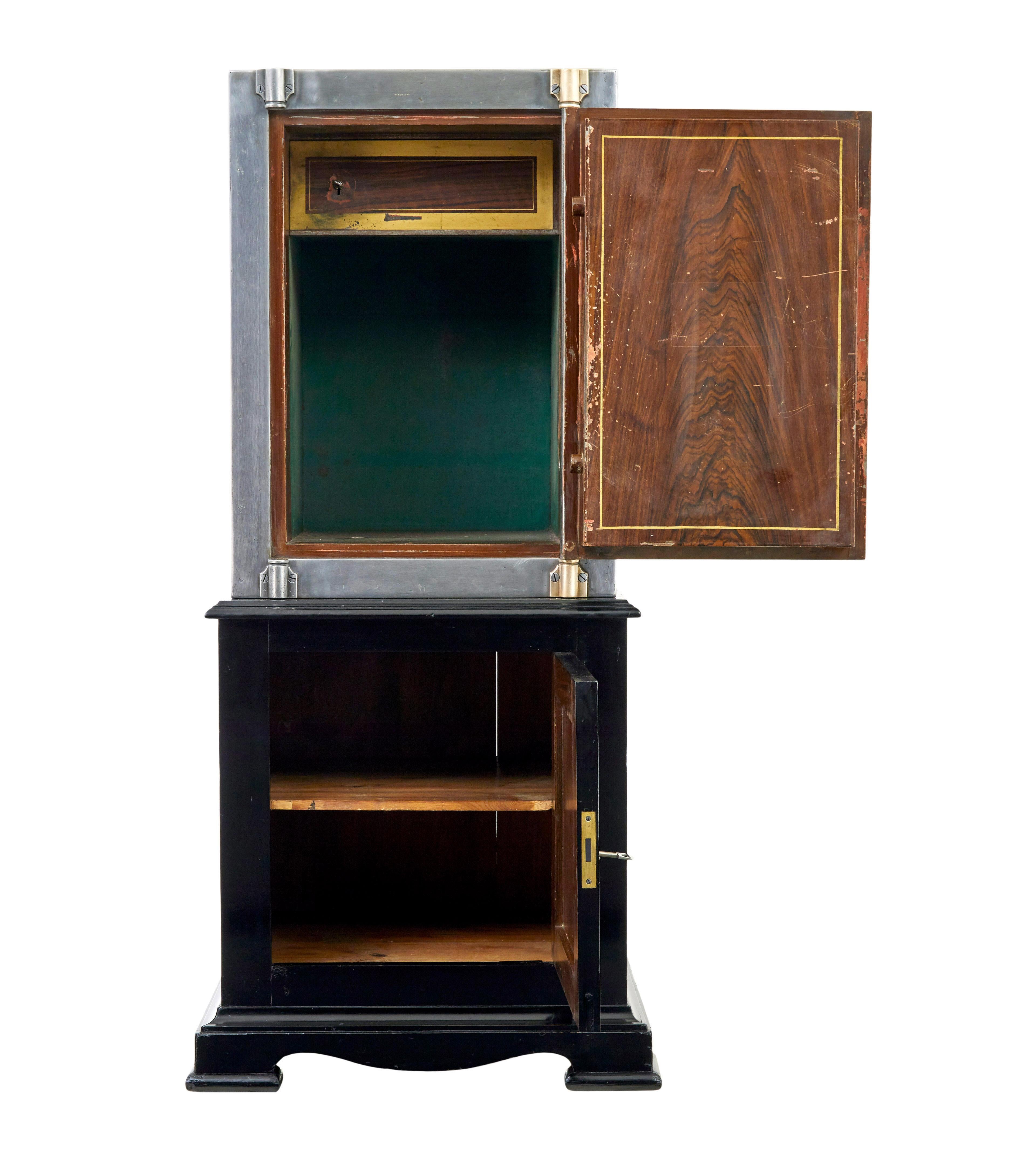 Cast 19th century Danish polished steel safe on cabinet For Sale