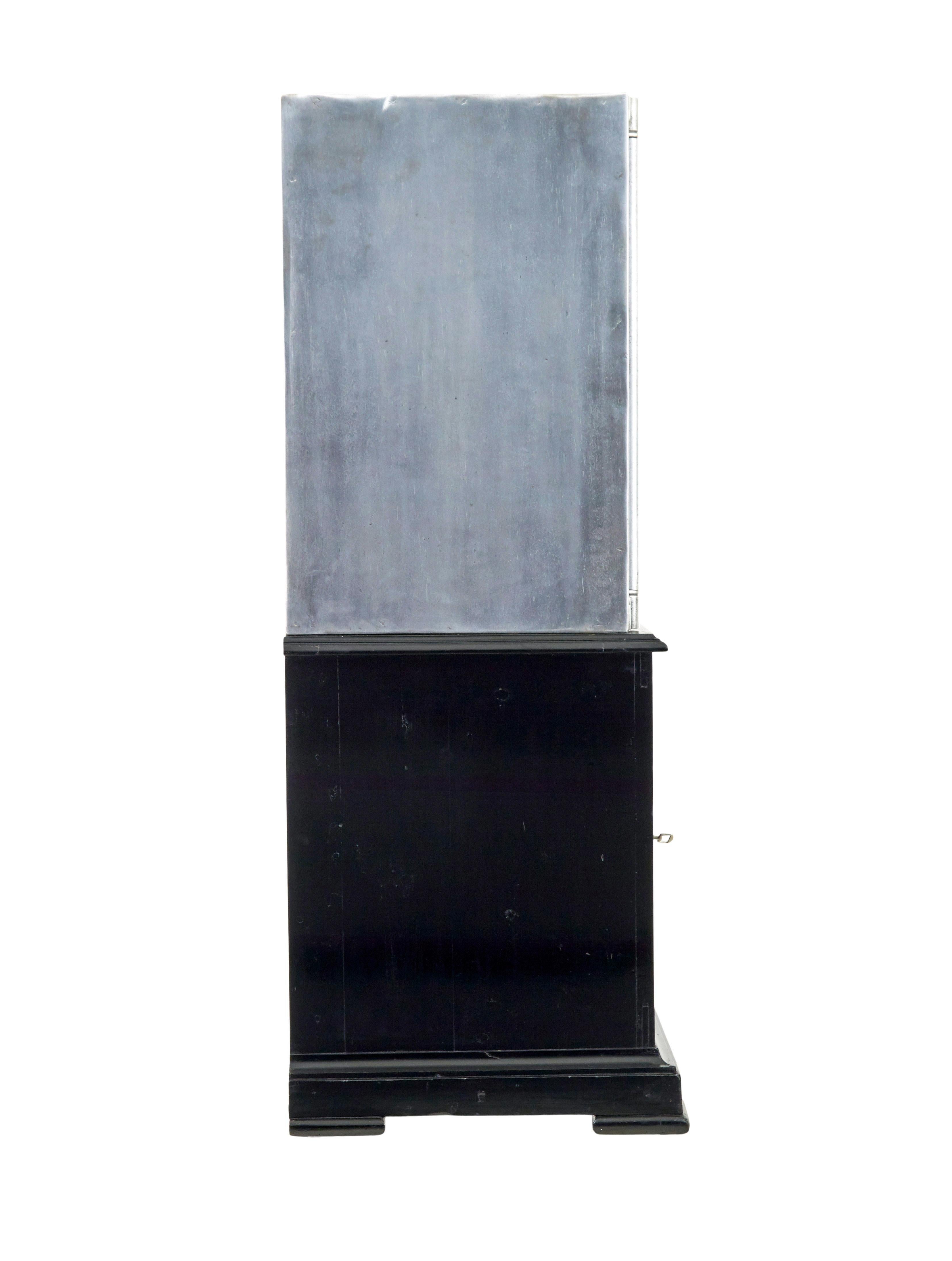 Steel 19th century Danish polished steel safe on cabinet For Sale