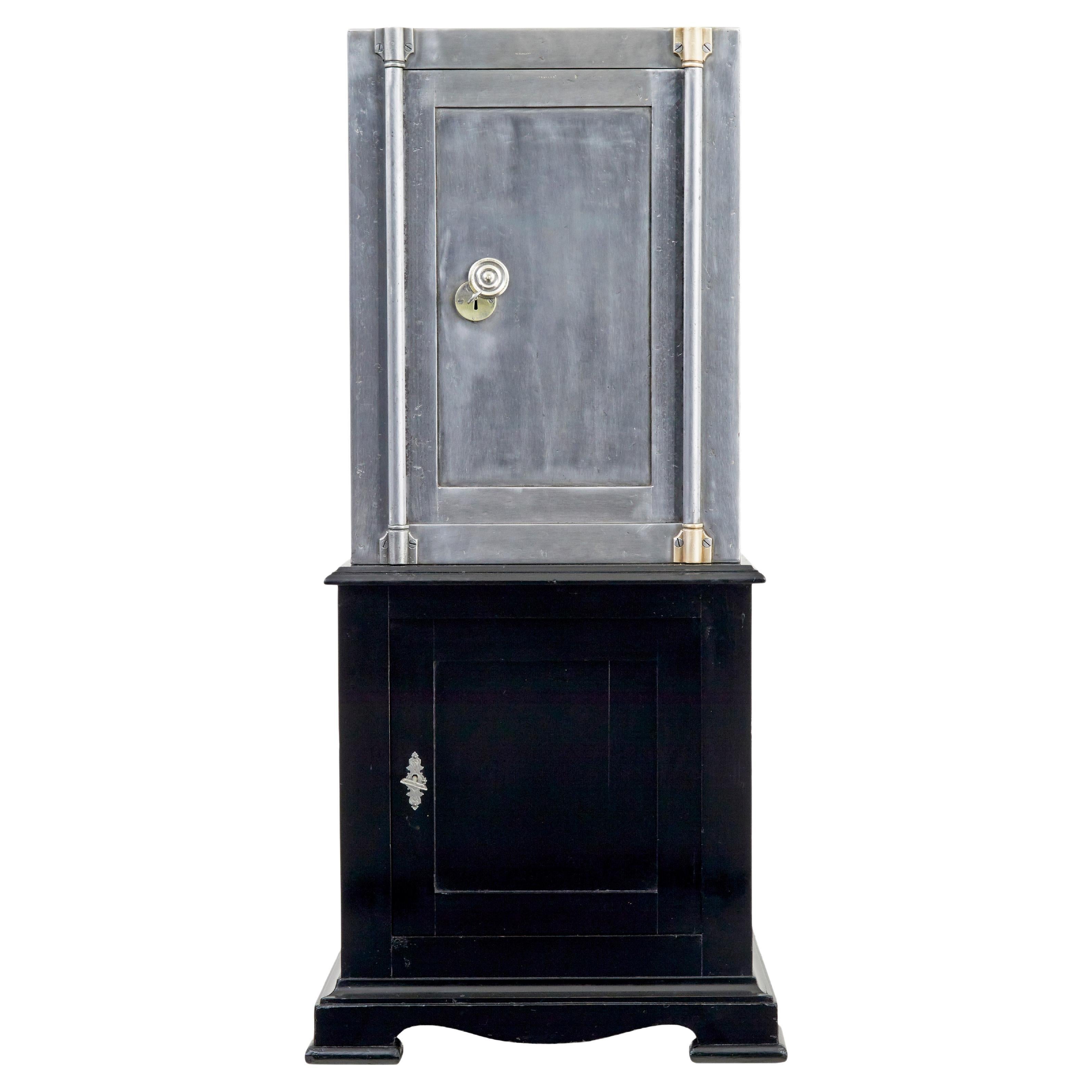 19th century Danish polished steel safe on cabinet For Sale