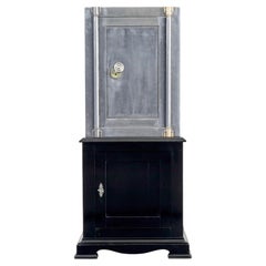 Used 19th century Danish polished steel safe on cabinet