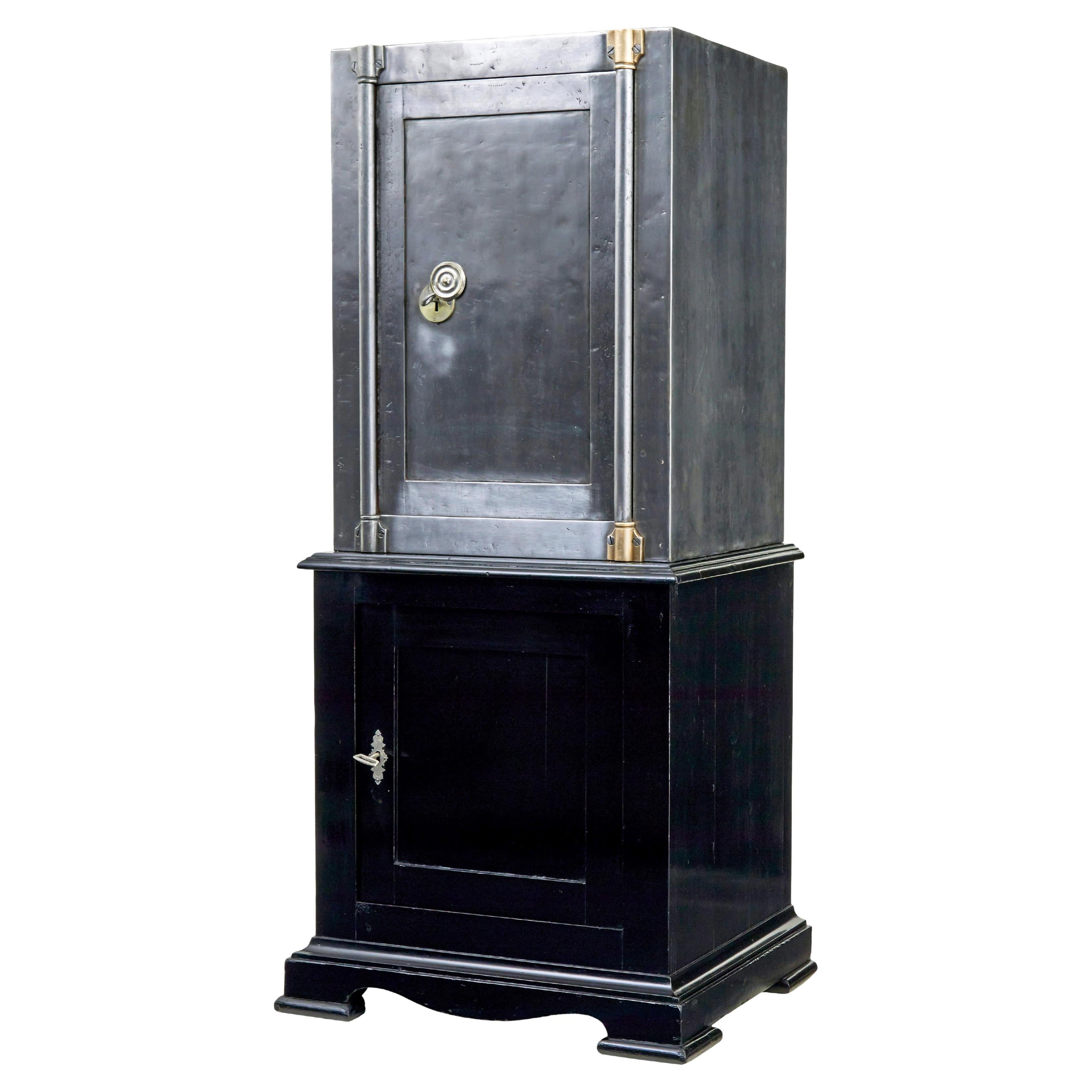 19th century Danish polished steel safe on cabinet For Sale