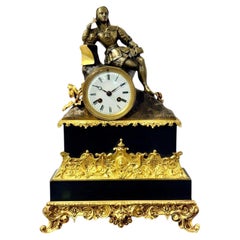 Reloj decorativo del siglo XIX de bronce dorado y mármol negro