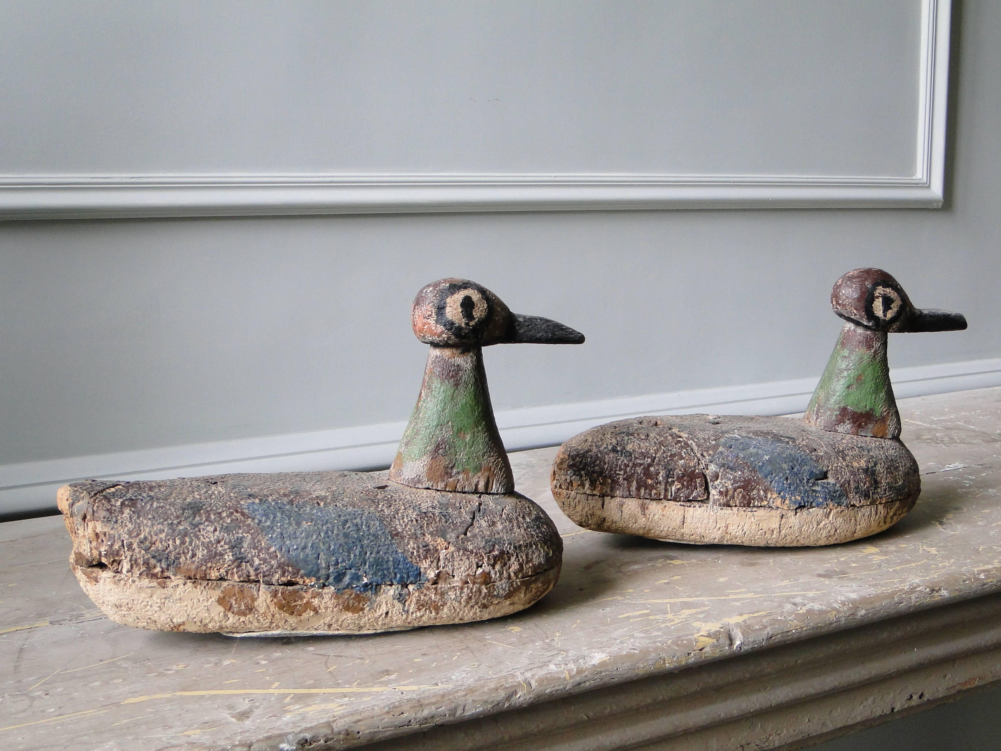 Two original painted decoy ducks, 19th century, wood and cork.