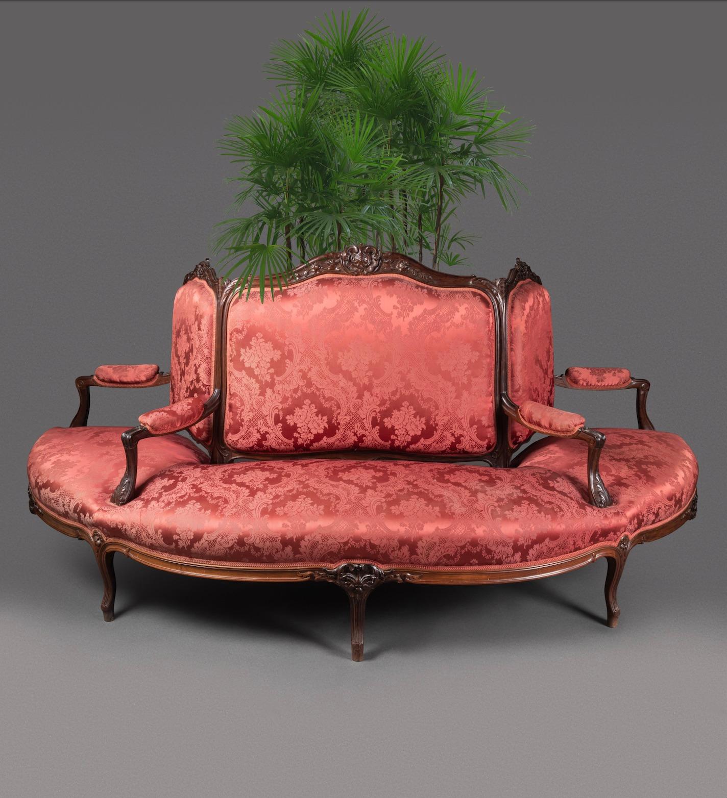 Very unusual 19th-century demi-borne in rosewood and damask fabric with an attached planter in the back.
France, circa 1860