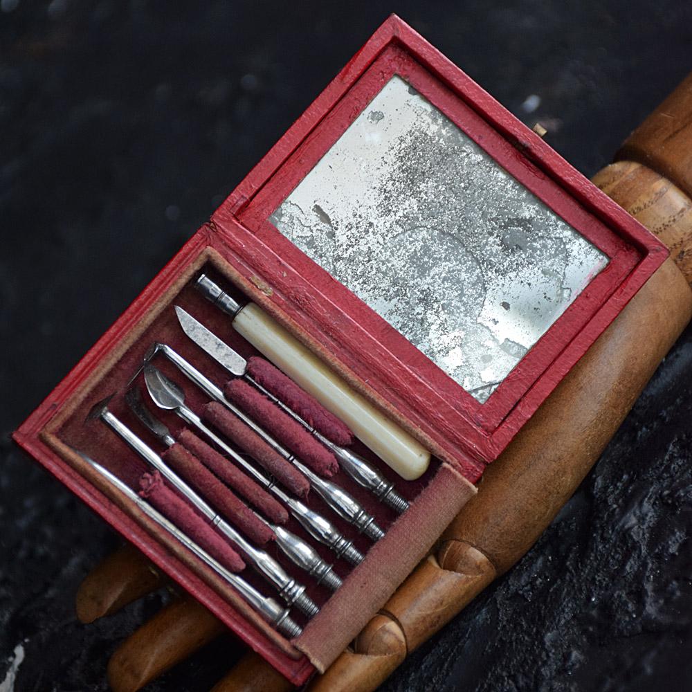 19th Century dental tool kit.

A rare set of 19th century dental tool kit, all tools are encased in a leather box with brass latch and lined with a worn red velour material. Its original mirror is still in place but distorted due to age and