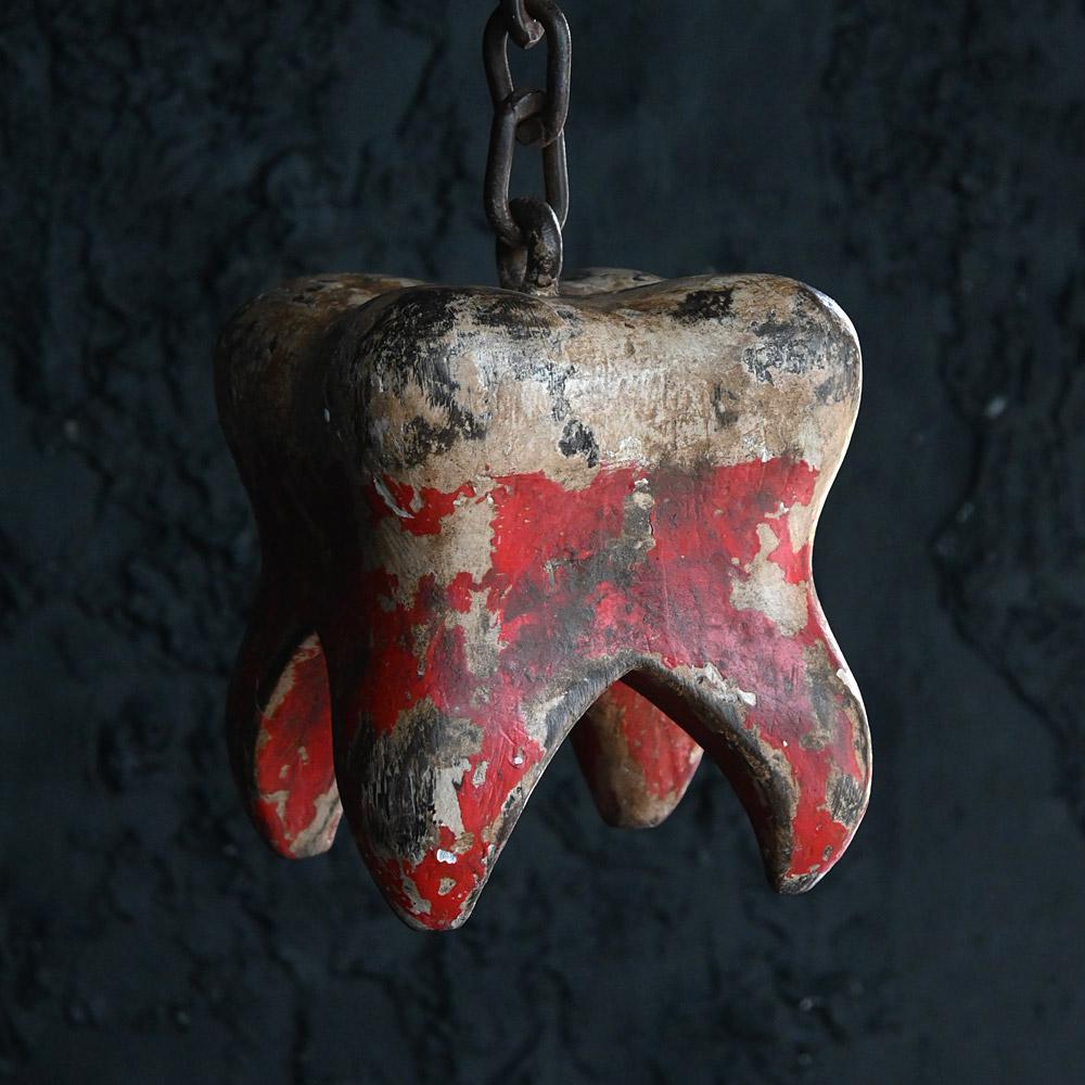 19th Century Dentist Trade Sign

We share what we love, and we love this rare English antique hand painted wooden dentist trade sign, with chain & hanging hook. Dated to the early 19th Century this is clearly not the sort of trade sign that was