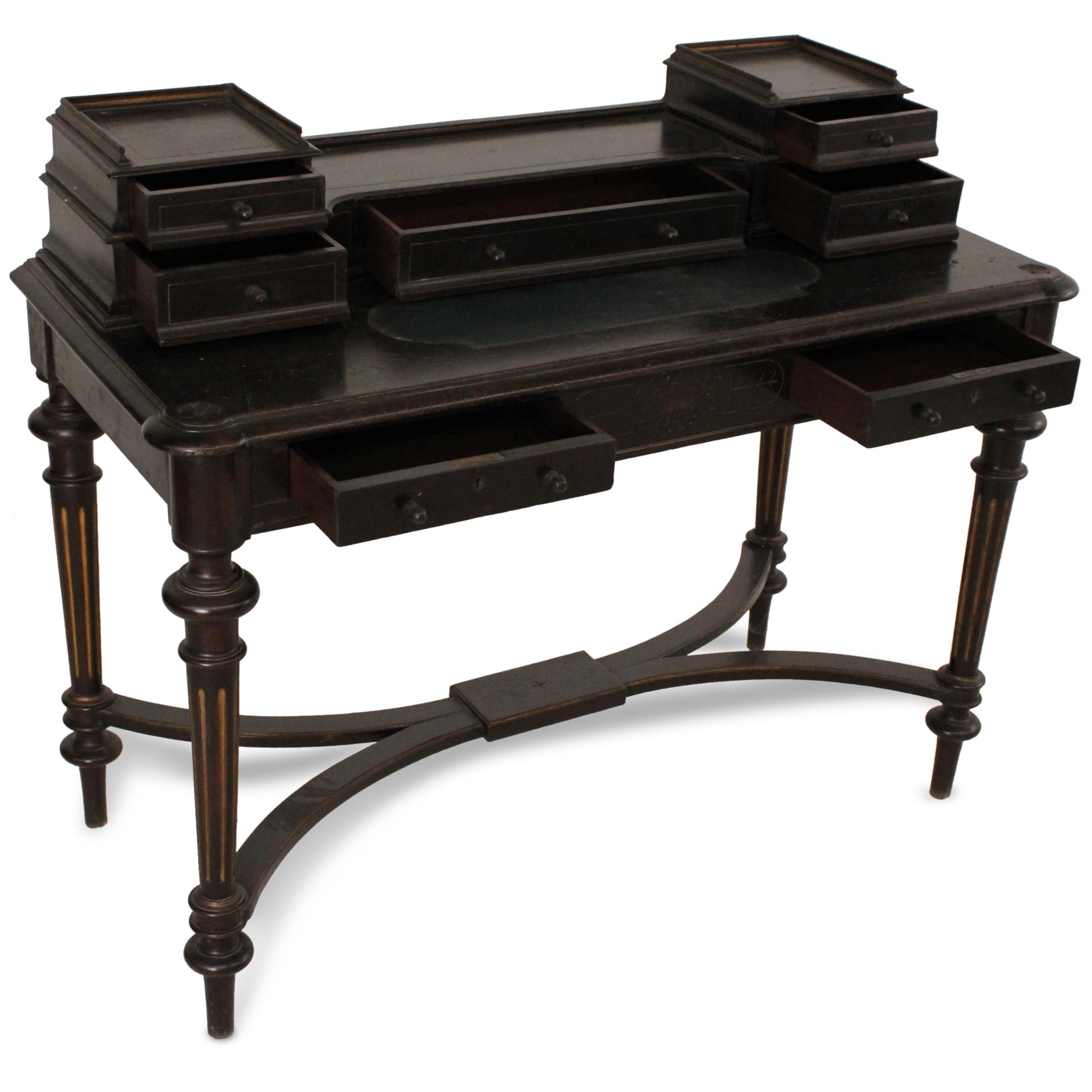 An extraordinary and unique work of master craftmanship, this 19th century desk from an Indian palace has its original set of stretchers, gilding on the fluted feet and a desirable antique patina. Enhancing the desk's functionality and aesthetic