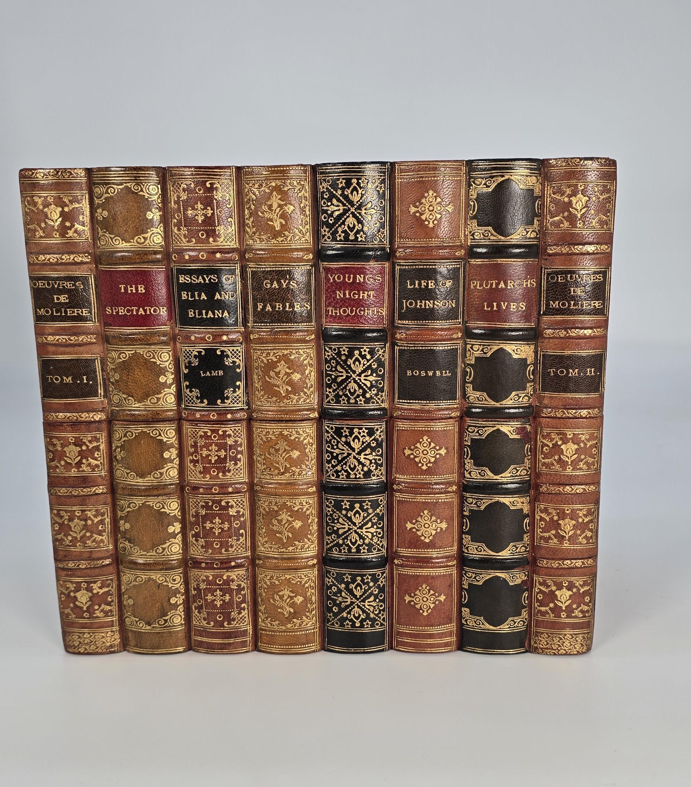 This most pleasing novelty box has been meticulously hand-made by a highly skilled English bookbinder in the late 19th century.

 To anybody looking, it genuinely looks like a small collection of fine hand-bound leather and gilt-tooled period books.