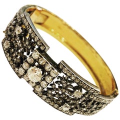 19th Century Diamond, 18 Karat Yellow Gold and Silver Bangle Bracelet
