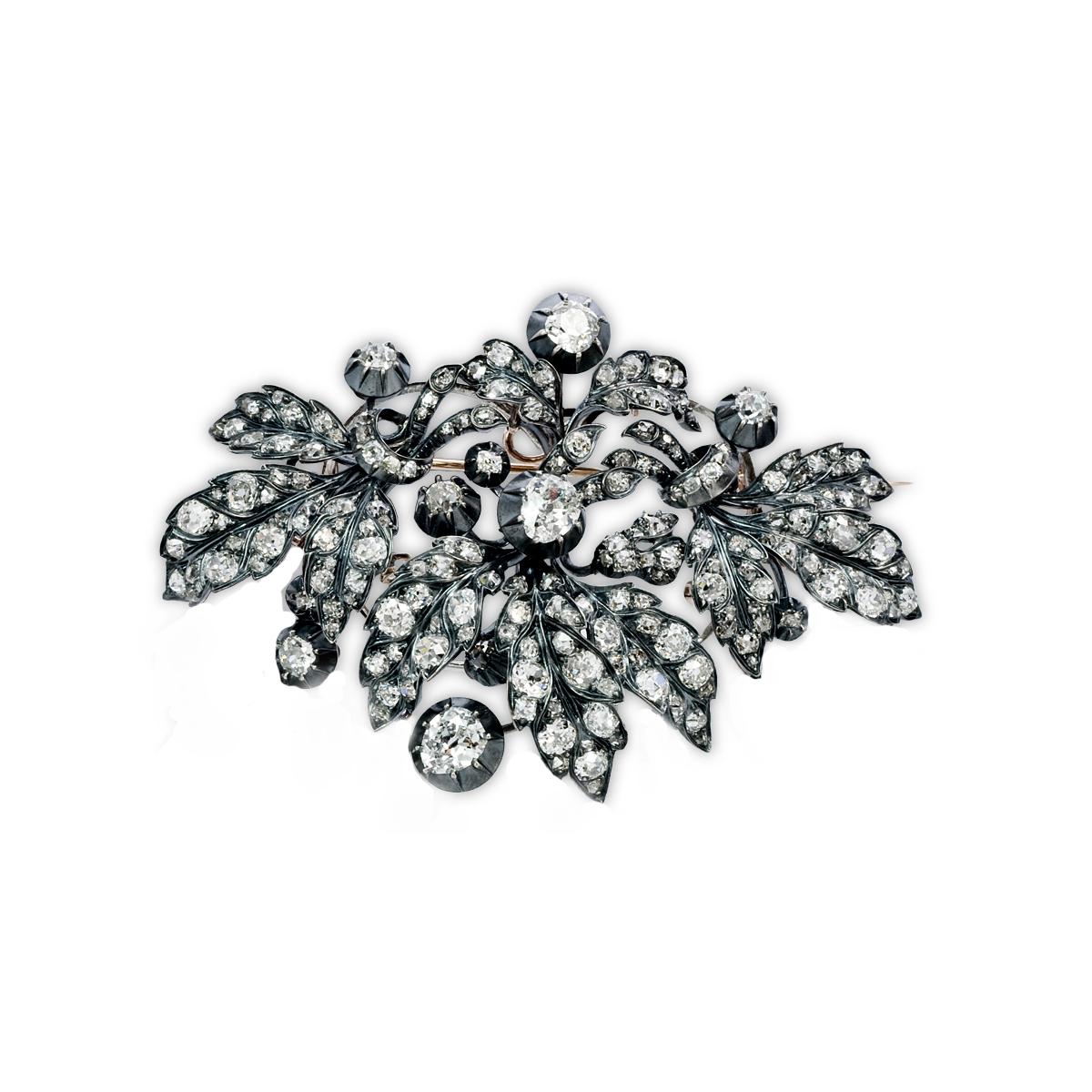 Important 19th Century Diamond Corsage Brooch
18K Gold, Silver and Diamond Floral Brooch, 386 Old Mine Cut Diamonds approximately 45ct; Ca1860 
(Wysteria vines are removable)