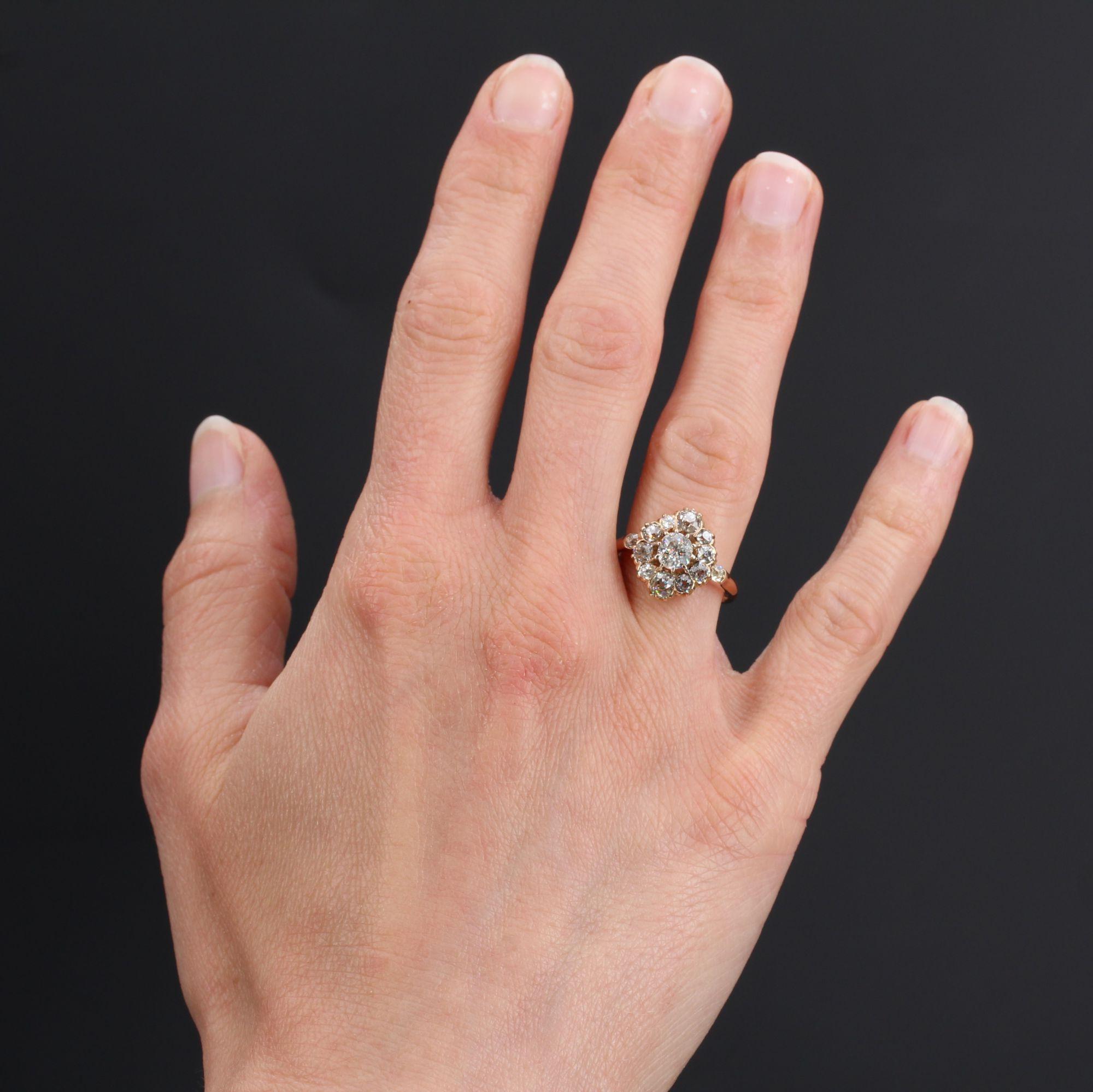  Ring in 14 karat rose gold, shell hallmark.
With a slight marquise shape, this antique ring is entirely set with antique cushion-cut diamonds. On either side, an antique cushion-cut diamond gives the start of the ring.
Weight of the main diamond :