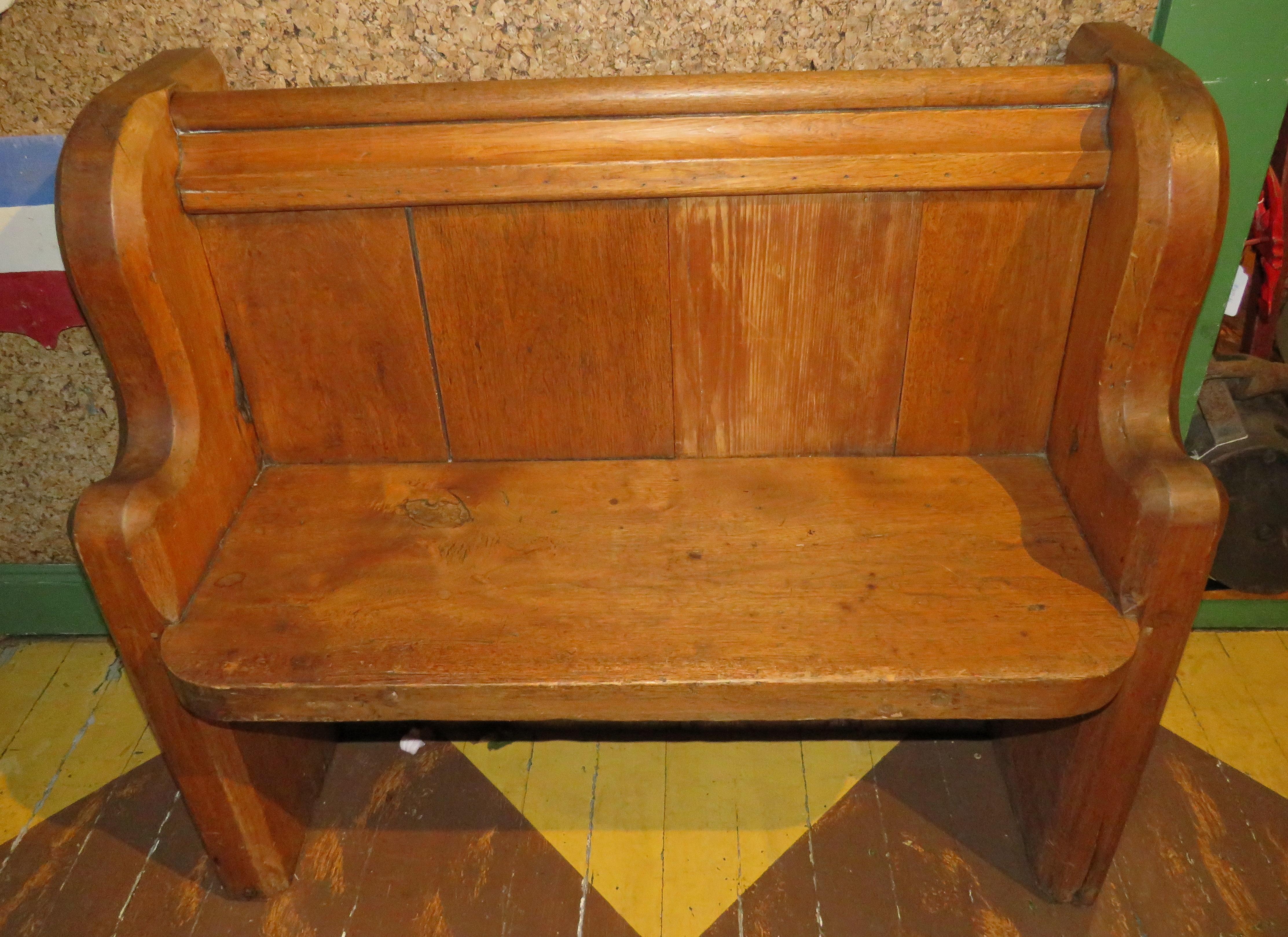 19th Century oak church pew or bench. Of diminutive size, crafted from thick, solid oak planks throughout, with curved sides and chamfered details.