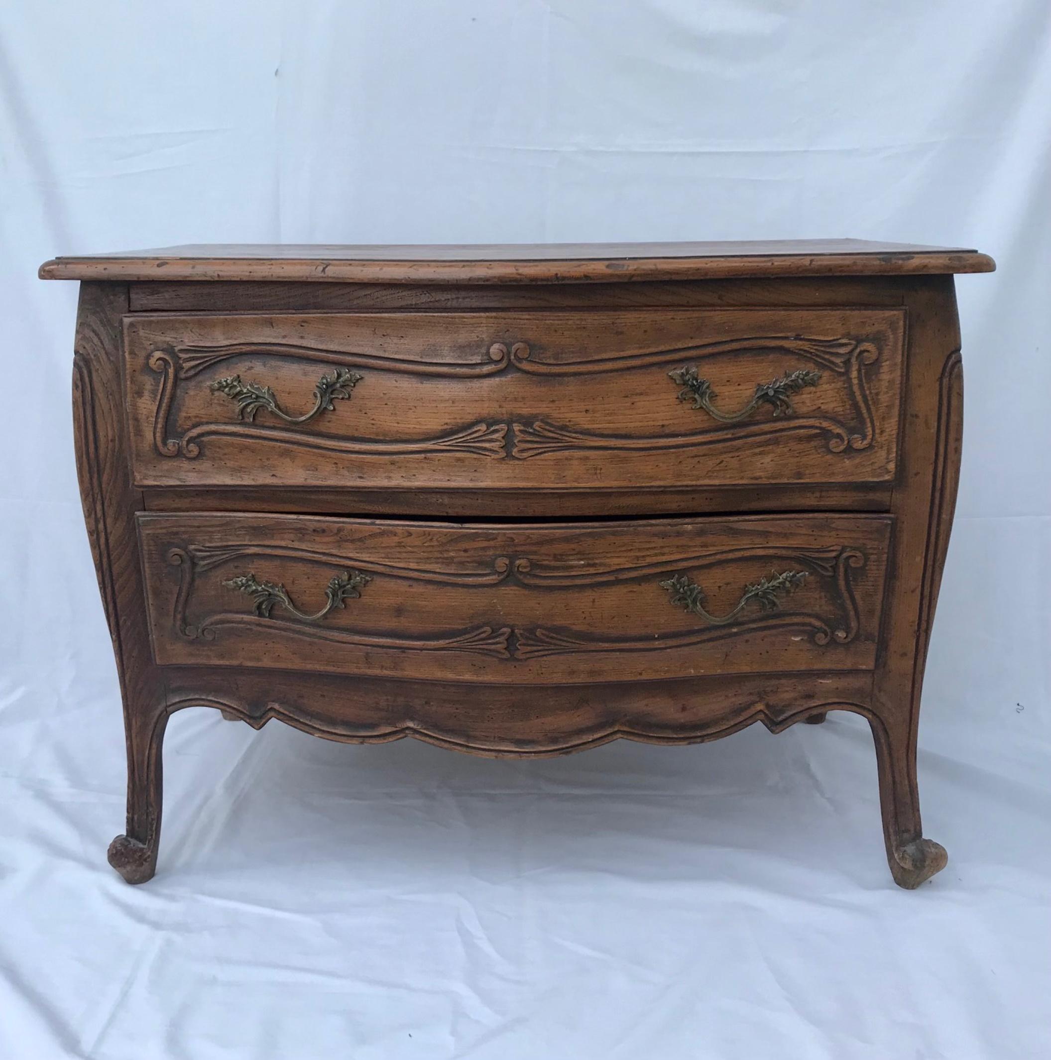 19th century Diminutive French Provincial Child’s chest of drawers

This child’s Baroque style French country chest of drawers has a finely serpentine façade that has two spacious and deep drawers which make it an elegant diminutive piece that is