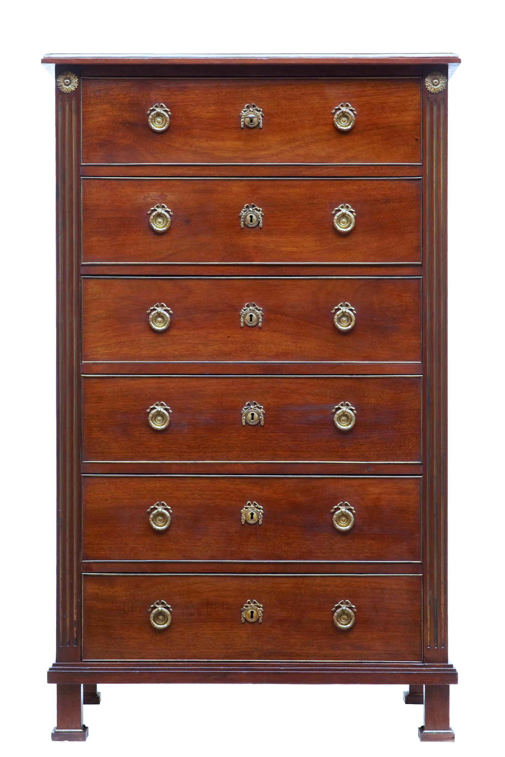 19th century directoire influenced mahogany tall chest of drawers, circa 1860.

Fine quality tall chest in the directoire style. Fitted with 6 drawers of equal proportions and detailed with cock beaded edging. Original ornate handles and key