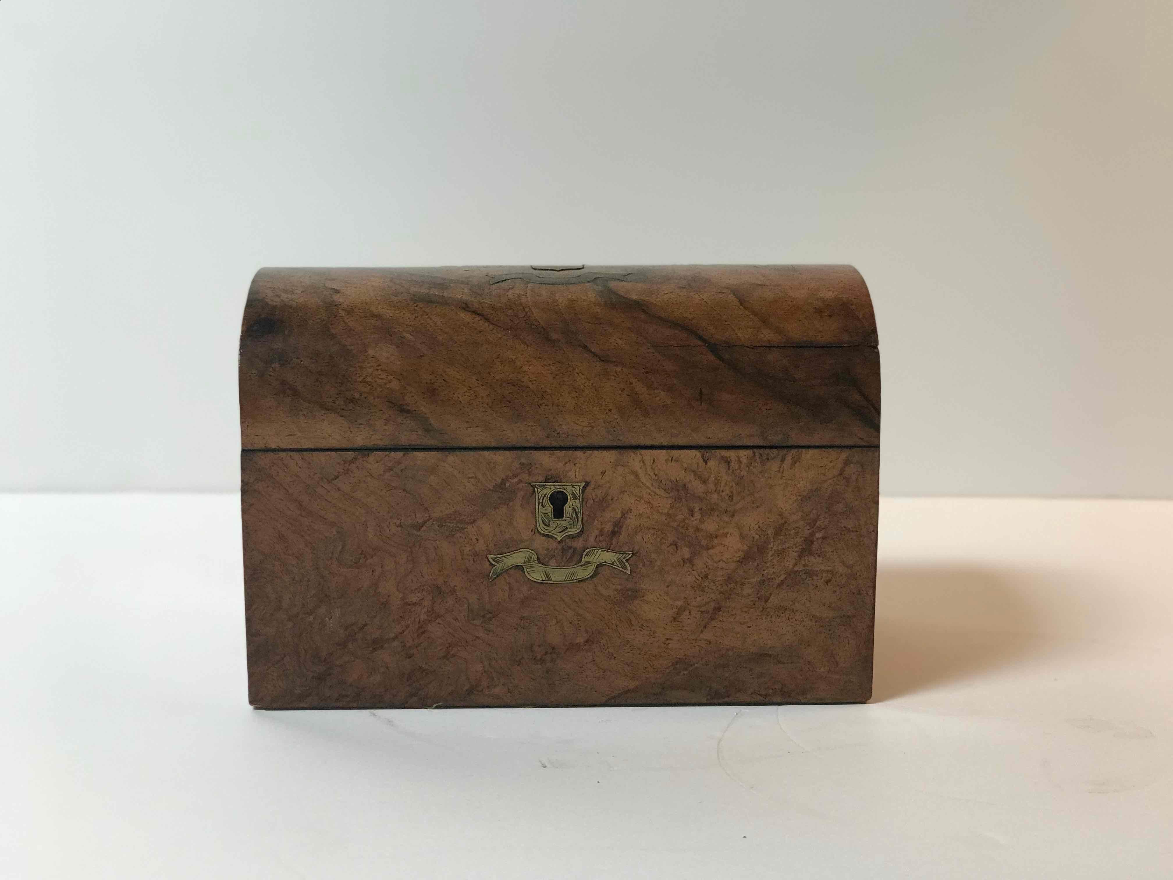 19th century domed tea caddy box with brass inlay from England. 