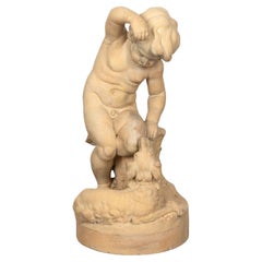 Estatua de terracota del siglo XIX Doulton & Co de un niño alimentando a un perro