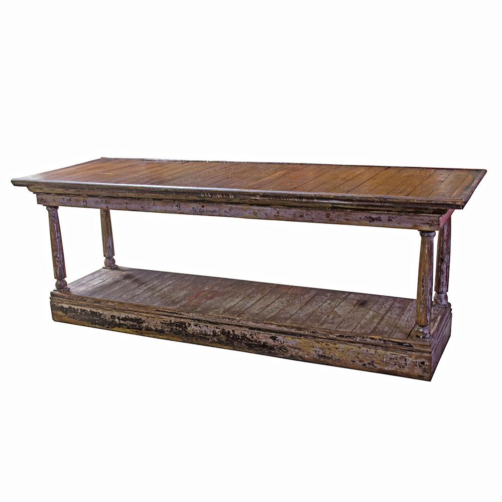 Draper’s tables were used in the textile manufacturing industry for both storage and construction of large swathes of fabric for draperies and other like applications. The lower storage shelf was used to hold bolts of fabric and the generous size