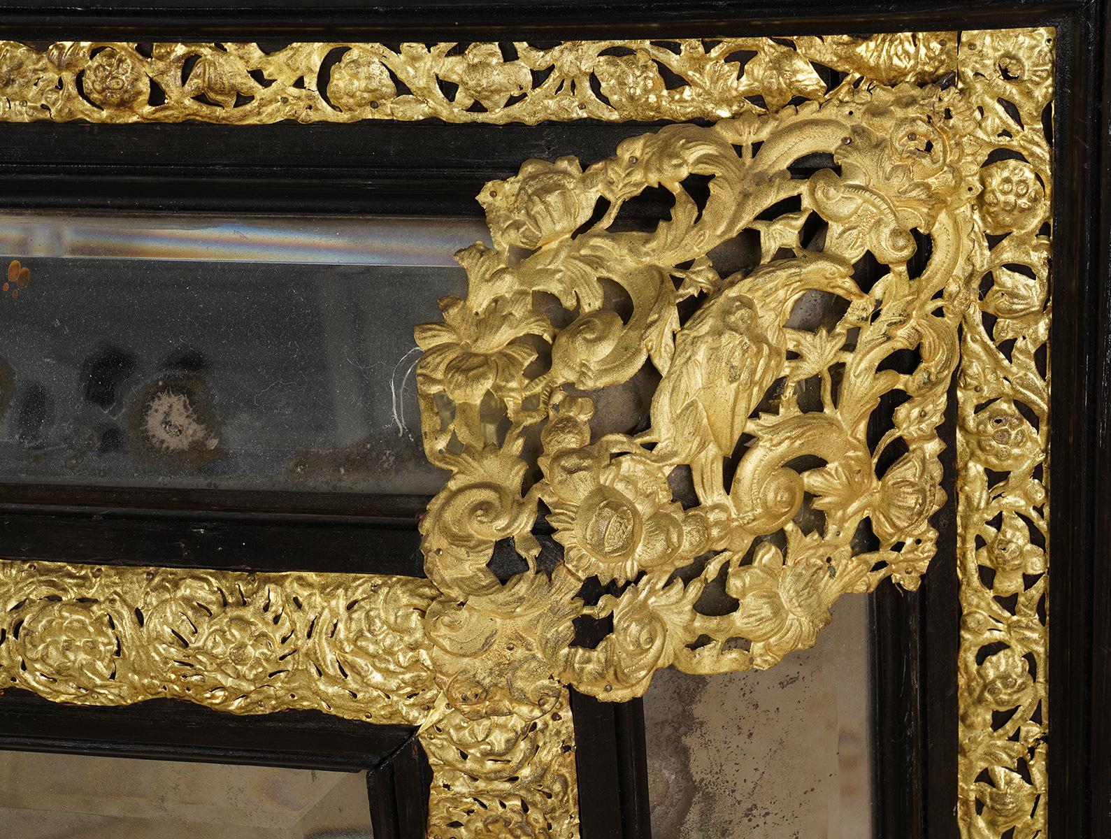 19th Century Dutch Baroque Style Ebonized and Repoussé Gilt Metal Framed Mirror In Good Condition In Ft. Lauderdale, FL