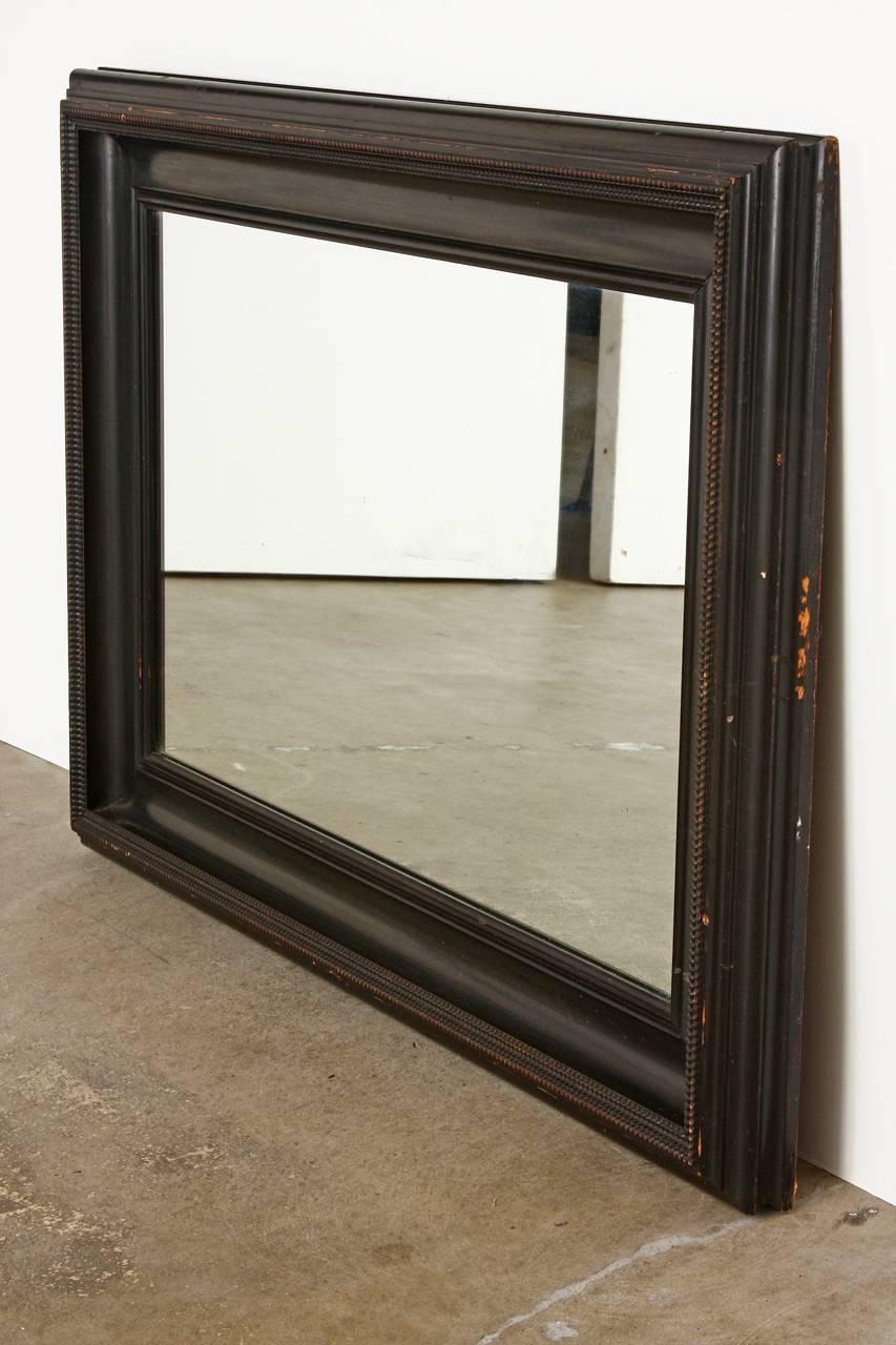 European 19th Century Dutch Baroque Style Ebonized Mirror
