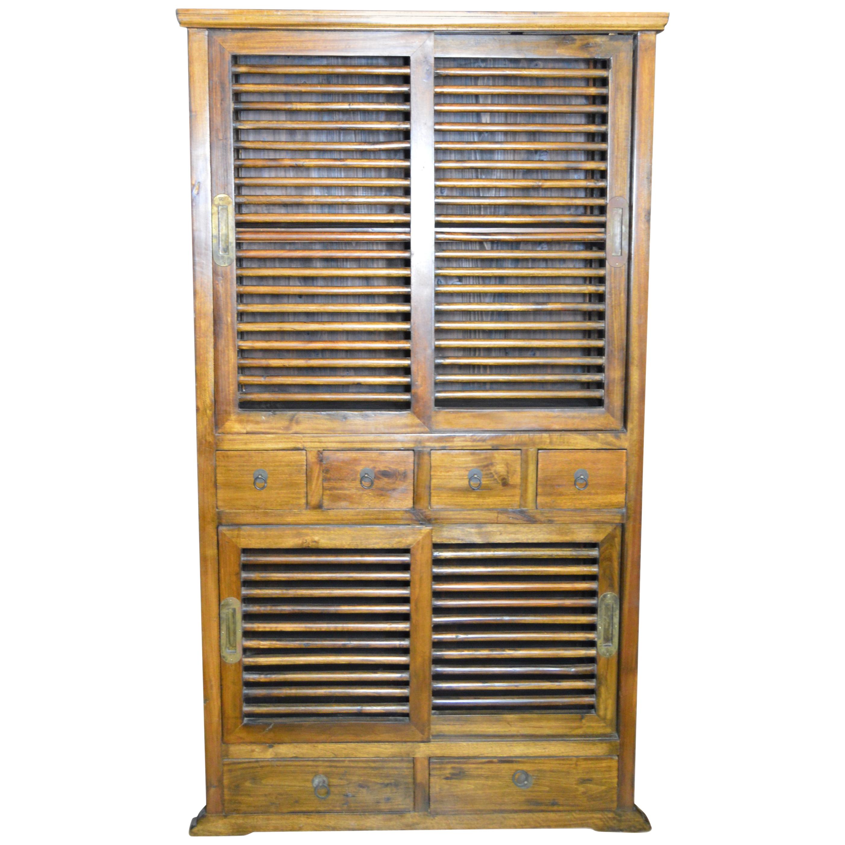 19th Century Dutch Colonial Armoire with Fretwork Sliding Doors and Drawers