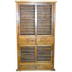 19th Century Dutch Colonial Armoire with Fretwork Sliding Doors and Drawers