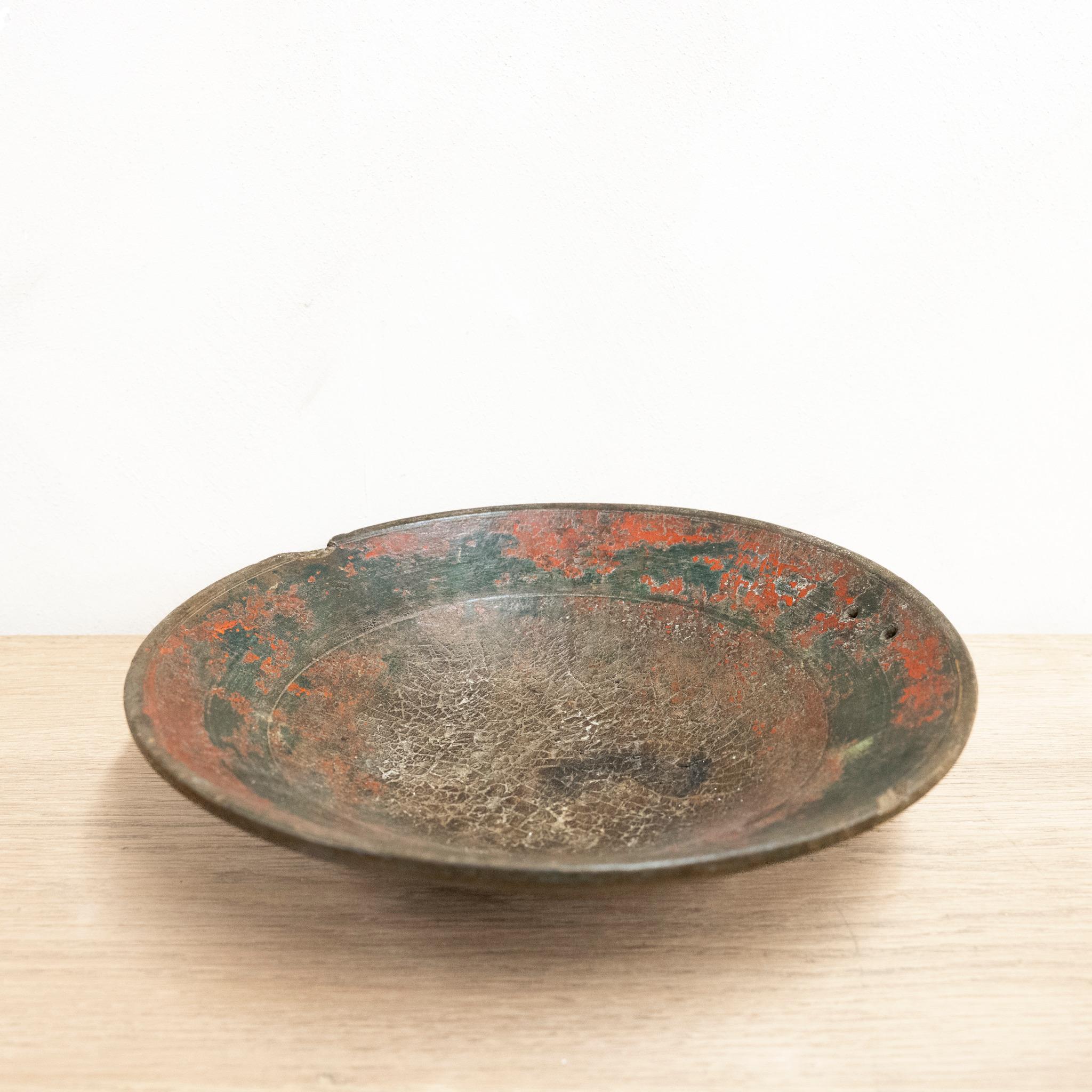 19th Century Dutch elm bowl,  hand turned from a single block of wood.
Purchased from a private collection, these have holes in the side so they can be hung on the wall as the wear and colour is a work of art. 
These were predominantly used in the