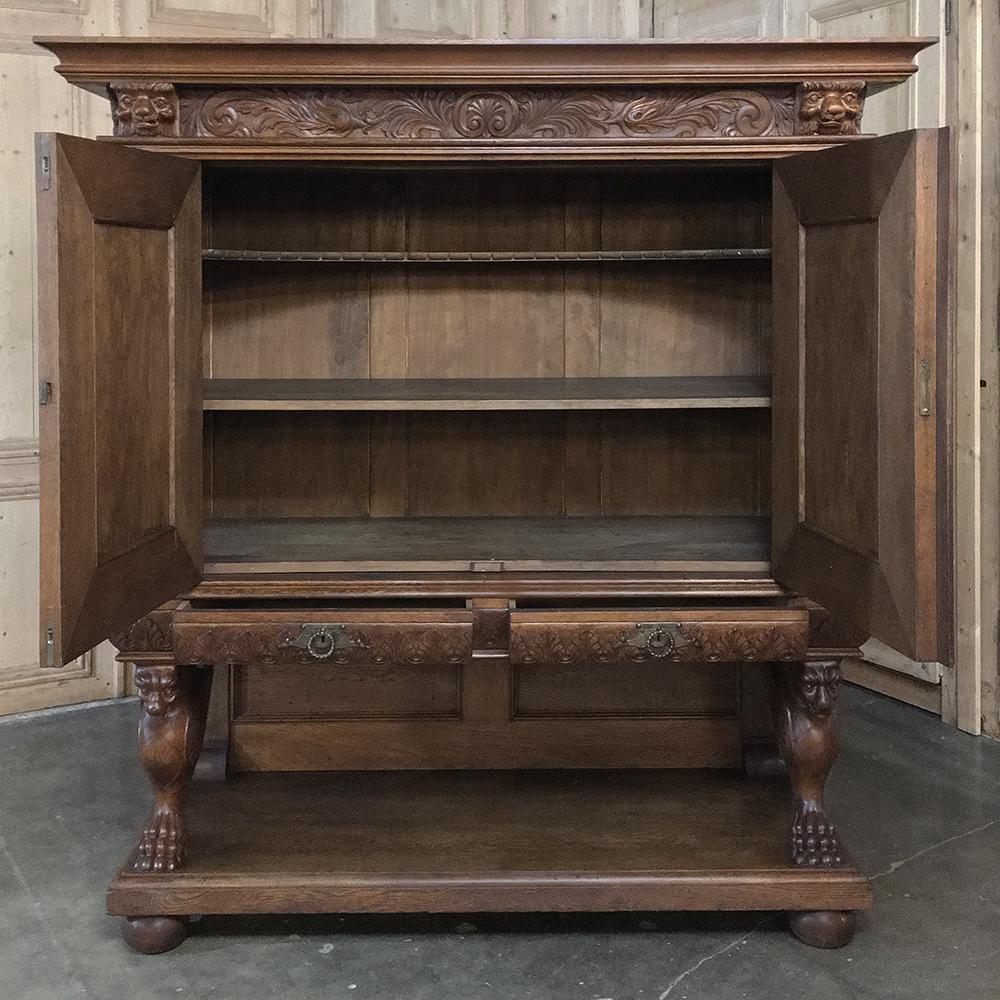 19th century Dutch hand carved Renaissance raised cabinet was rendered from dense, old-growth quarter sawn oak, examples of which are on display in museums across Belgium and Holland that are over 1,000 years old! This stunning example features