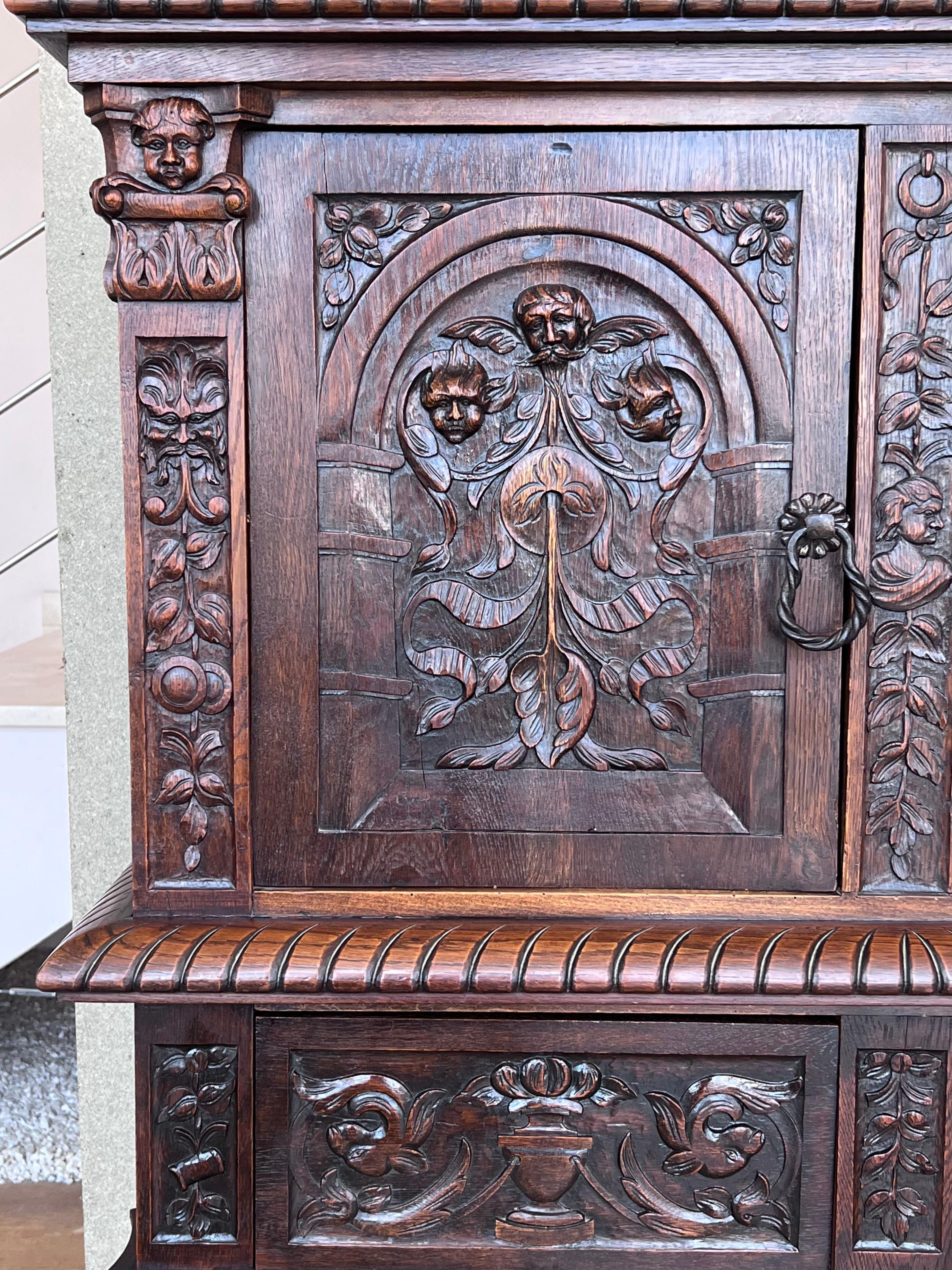 Baroque 19th Century Dutch Hand Carved Renaissance Raised Cabinet For Sale