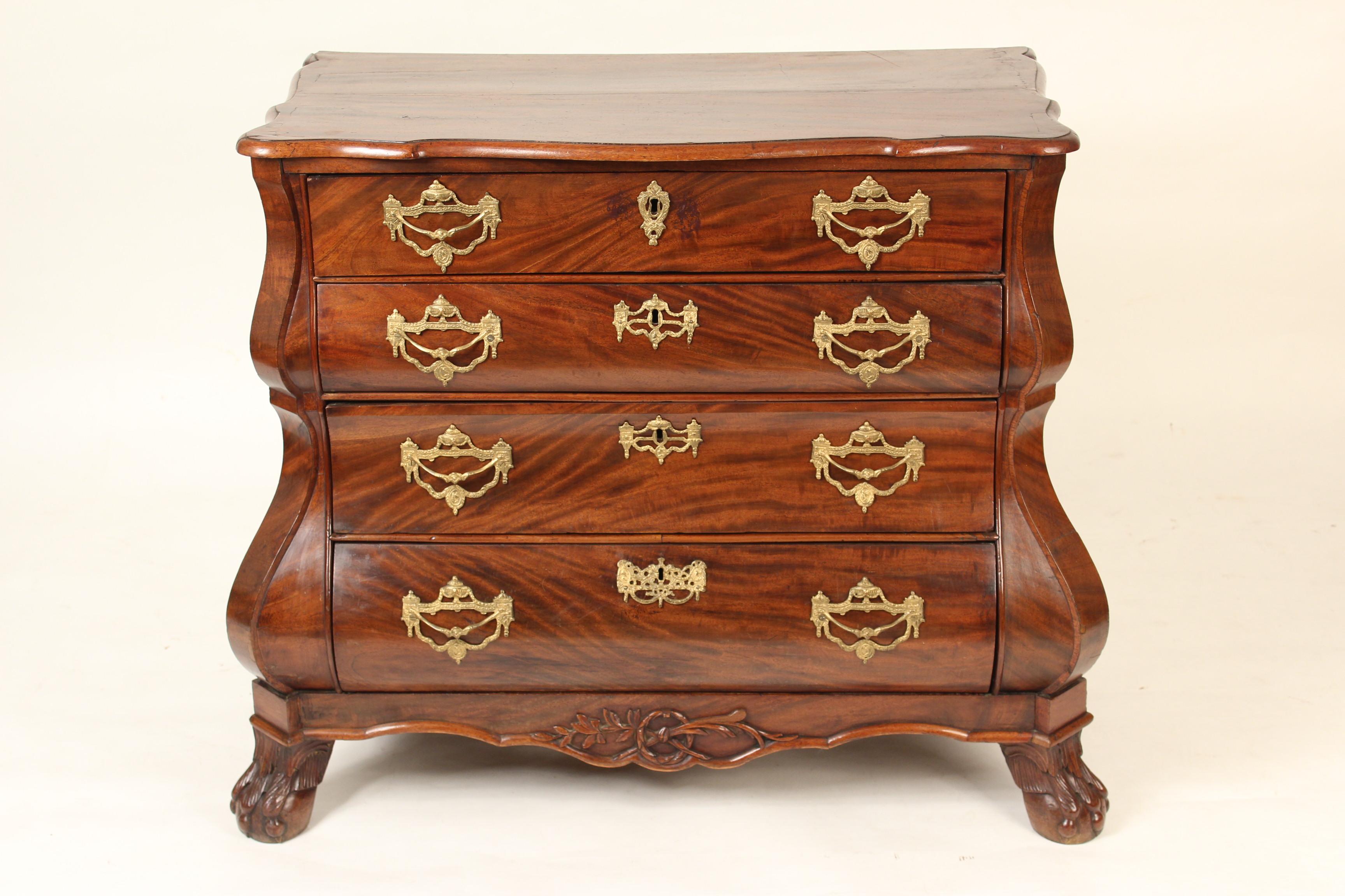 Dutch mahogany kettle base chest of drawers with brass hardware, 19th century. This chest has excellent quality mahogany and brass hardware.