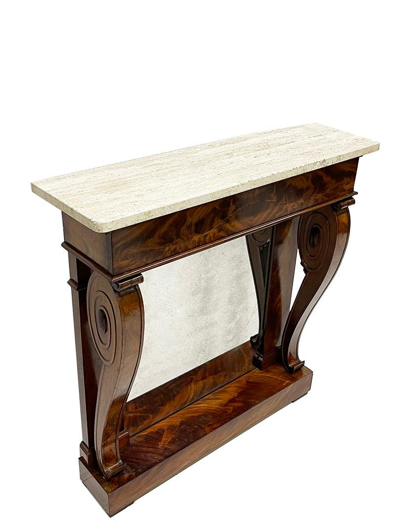 19th century Dutch mahogany console table with marble top

A beautifully flamed with round shapes Dutch mahogany wood console table with marble top and mirror.
The marble top is loose on the console table
The mirror is slightly weathered and the