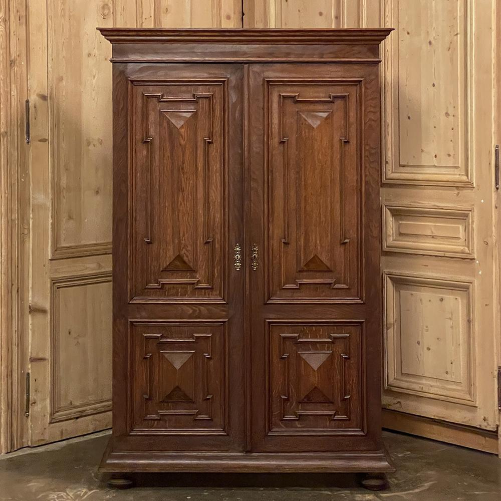 19th Century Dutch Oak Armoire ~ Cabinet was created in a relatively smaller size making it perfect for special niches, rooms with 8 foot ceilings, under stairwells or fur-downs, and the like.  Hand-crafted from solid oak to last for centuries, it