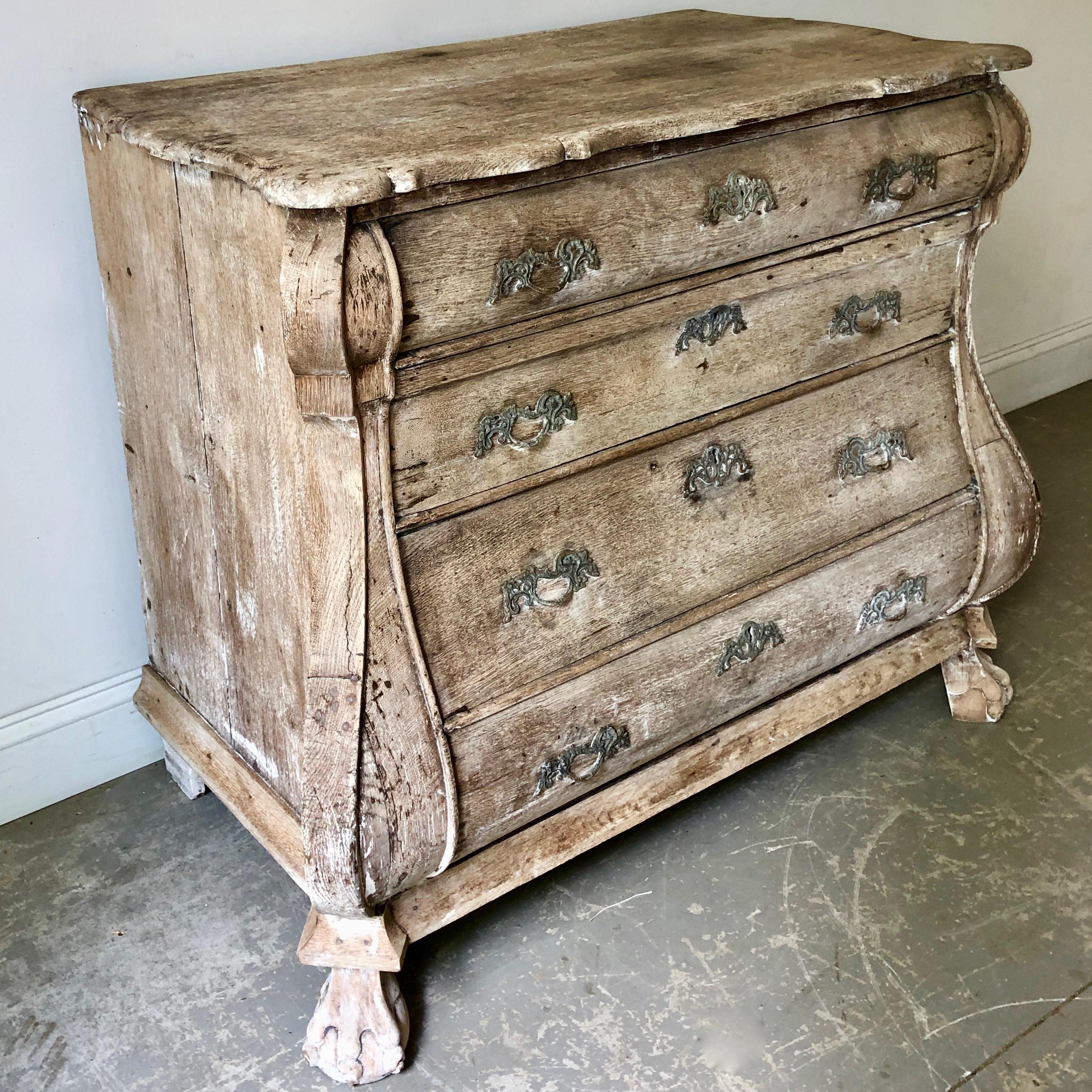 A charmingly carved bombe front Dutch commode in bleached oak with original bronze hardwares.
Holland, circa 1860
More than ever, we selected the best, the rarest, the unusual, the spectacular, the most charming what makes people dreaming!