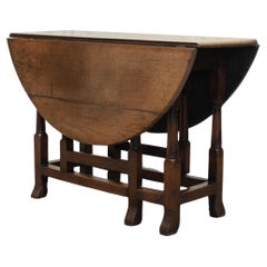 Table "hangoor" en chêne hollandais du 19e siècle à pied tombant
