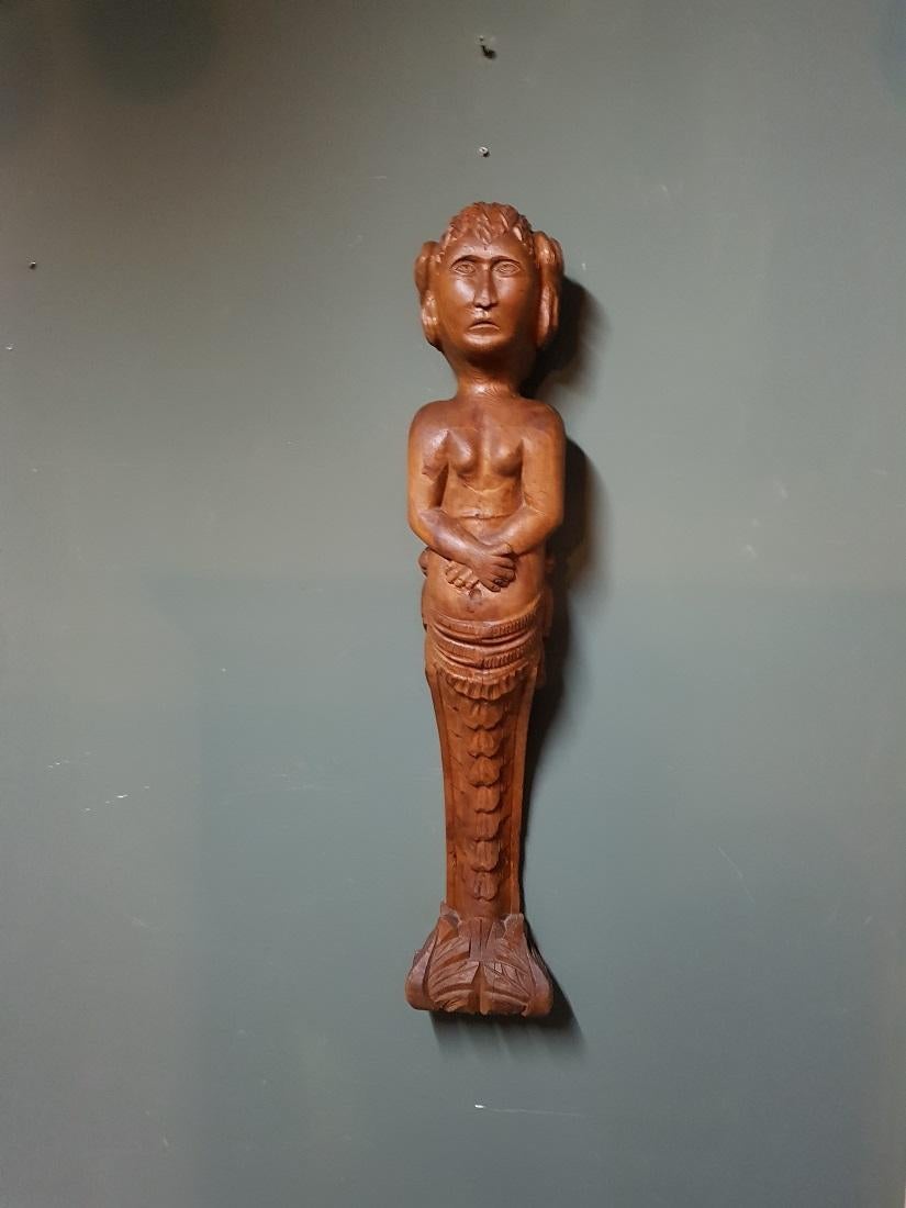 Beautiful as wall decoration this Antique oak Dutch pilaster or caryatid with the representation of a mythical creature called a mermaid and probably came from a fireplace. 

The measurements are,
Depth 17 cm/ 6.6 inch.
Width 19 cm/ 7.4 inch.
Height