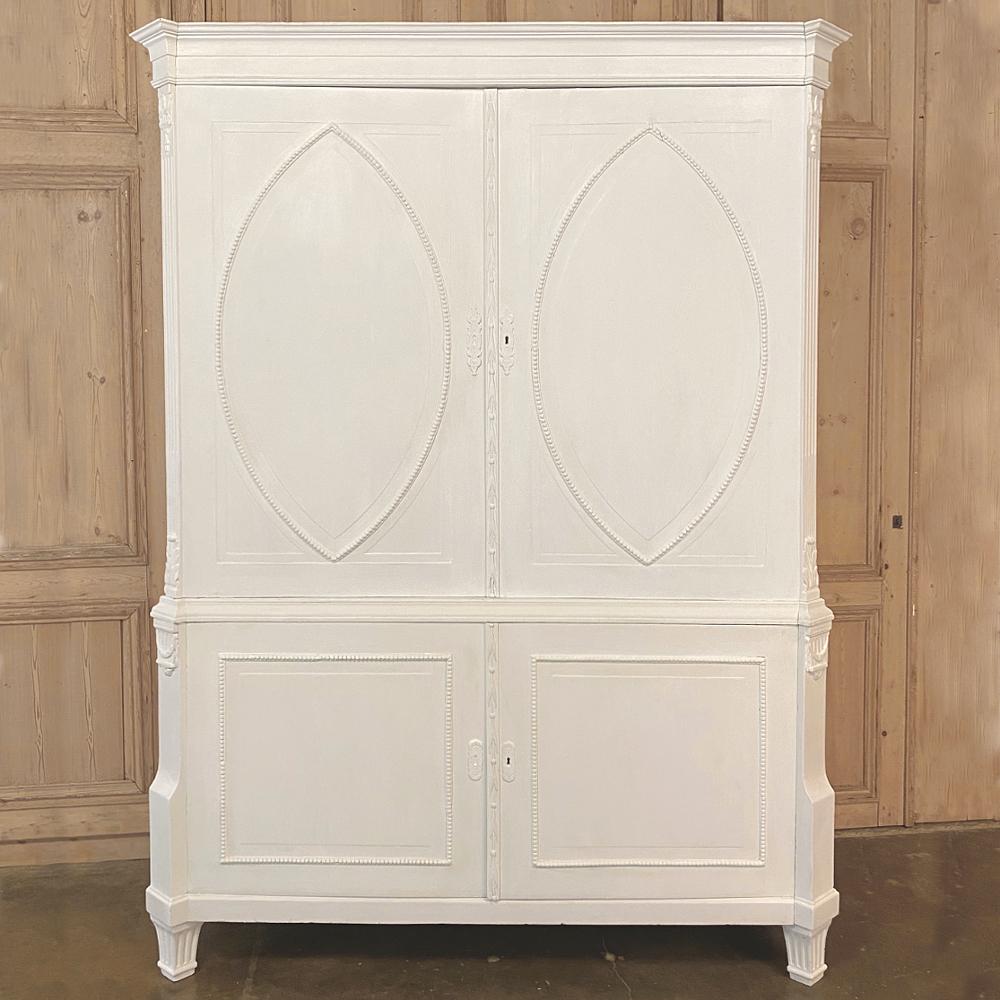 19th Century Dutch Painted Linen Cabinet is ideal for any room in the home or office, providing capacious storage in style, with a light and airy impact thanks to the lovely patinaed white painted finish.  Doors above open slightly more than 180