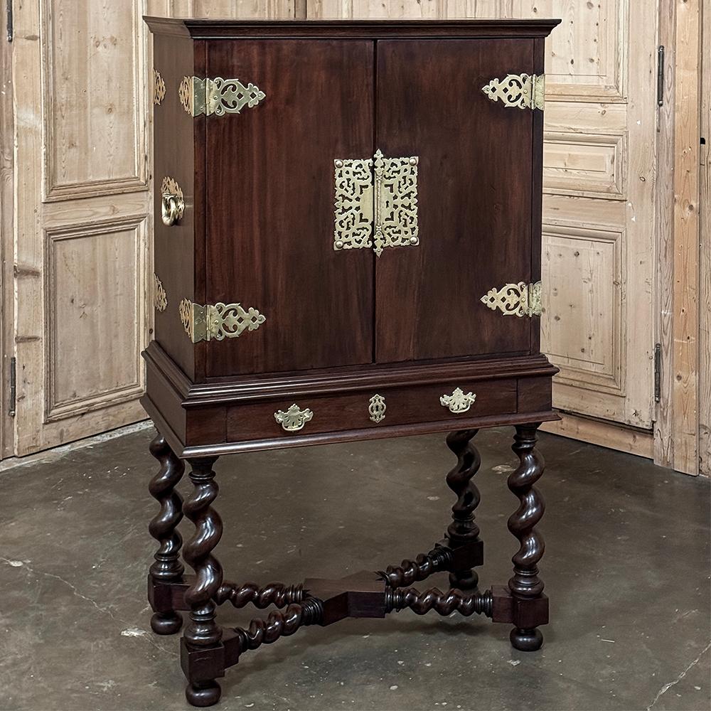 19th Century Dutch Raised Cabinet in the Chinoiserie Style is a splendid example of highly talented European craftsmen imitating popular styles during the craze for all things Oriental during the 1800s.  This example was cleverly constructed from an