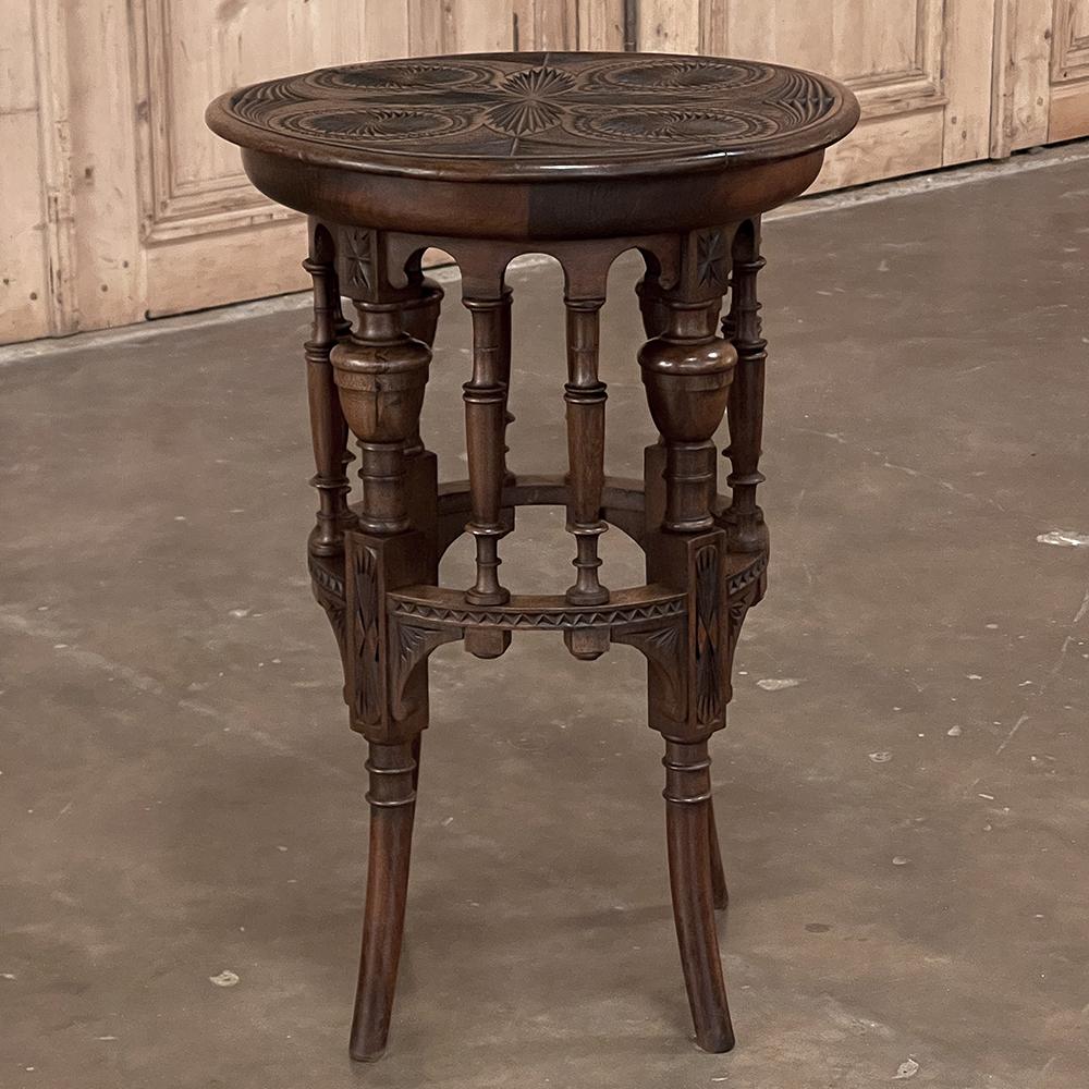 19th century Dutch Renaissance carved lamp table ~ end table combines an incredibly inspired design with meticulous craftsmanship and artistry in sculpture for an amazing work that far outshines its diminutive size. Created from old growth walnut,