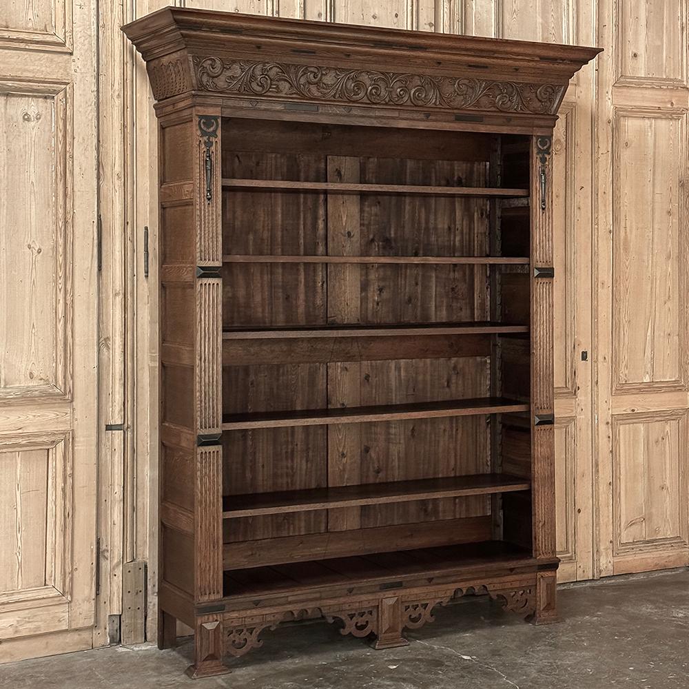 19th Century Dutch Renaissance Open Bookcase was designed to impress on a variety of levels!  First, only the affluent could afford an education sufficient to warrant the ownership of expensive books.  Secondly, the books were indeed expensive. 