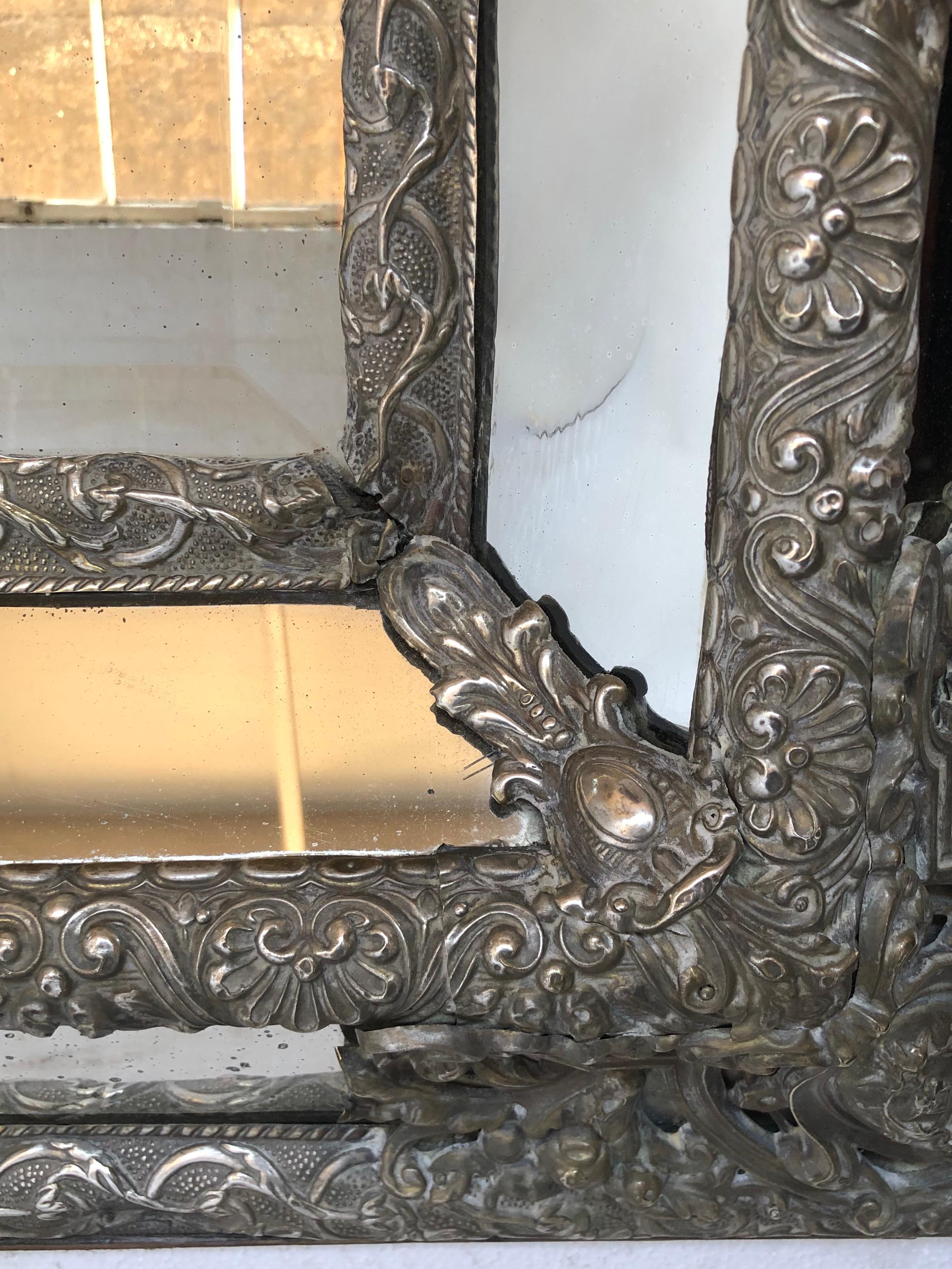 Dutch Colonial 19th Century Dutch Repousse Silvered Metal Marginal Cushion Wall Mirror