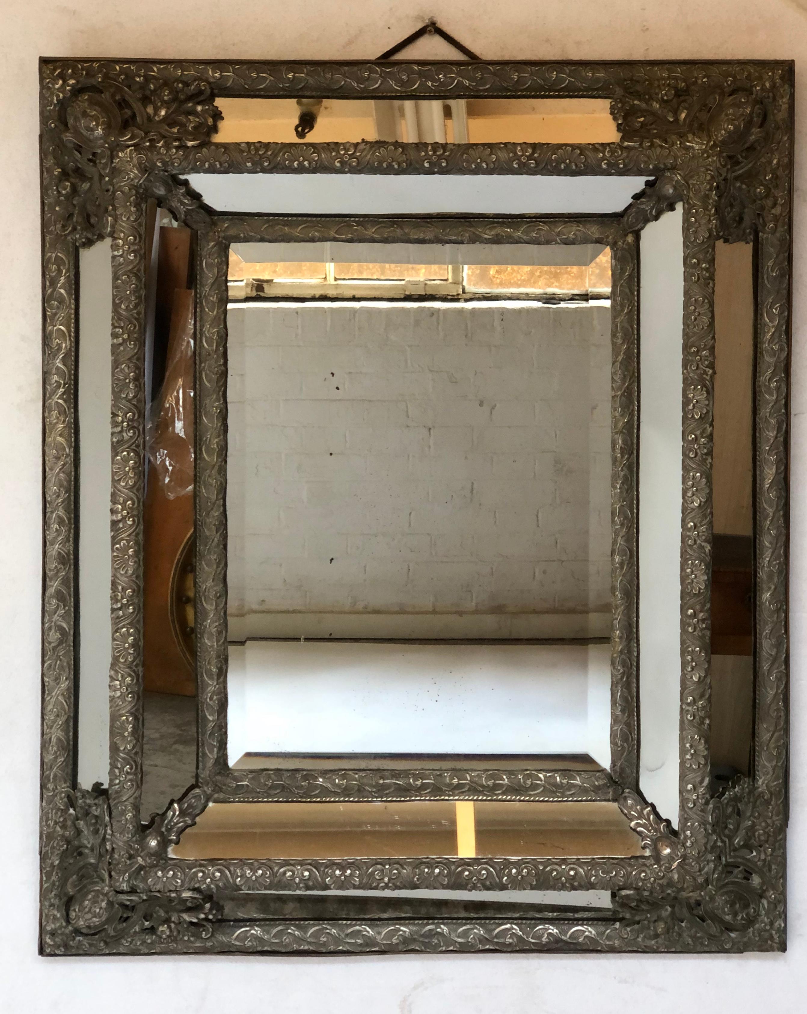 Beveled 19th Century Dutch Repousse Silvered Metal Marginal Cushion Wall Mirror