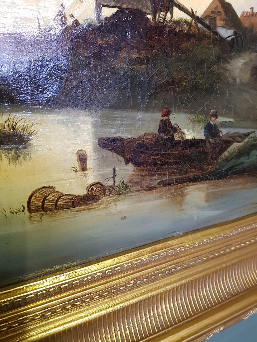 19th Century Dutch School Oil Painting with Landscape of Fishermen Near a Mill In Fair Condition For Sale In Raalte, NL