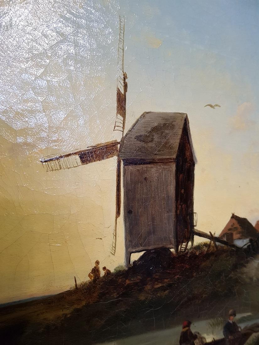 19th Century Dutch School Oil Painting with Landscape of Fishermen Near a Mill In Fair Condition For Sale In Raalte, NL