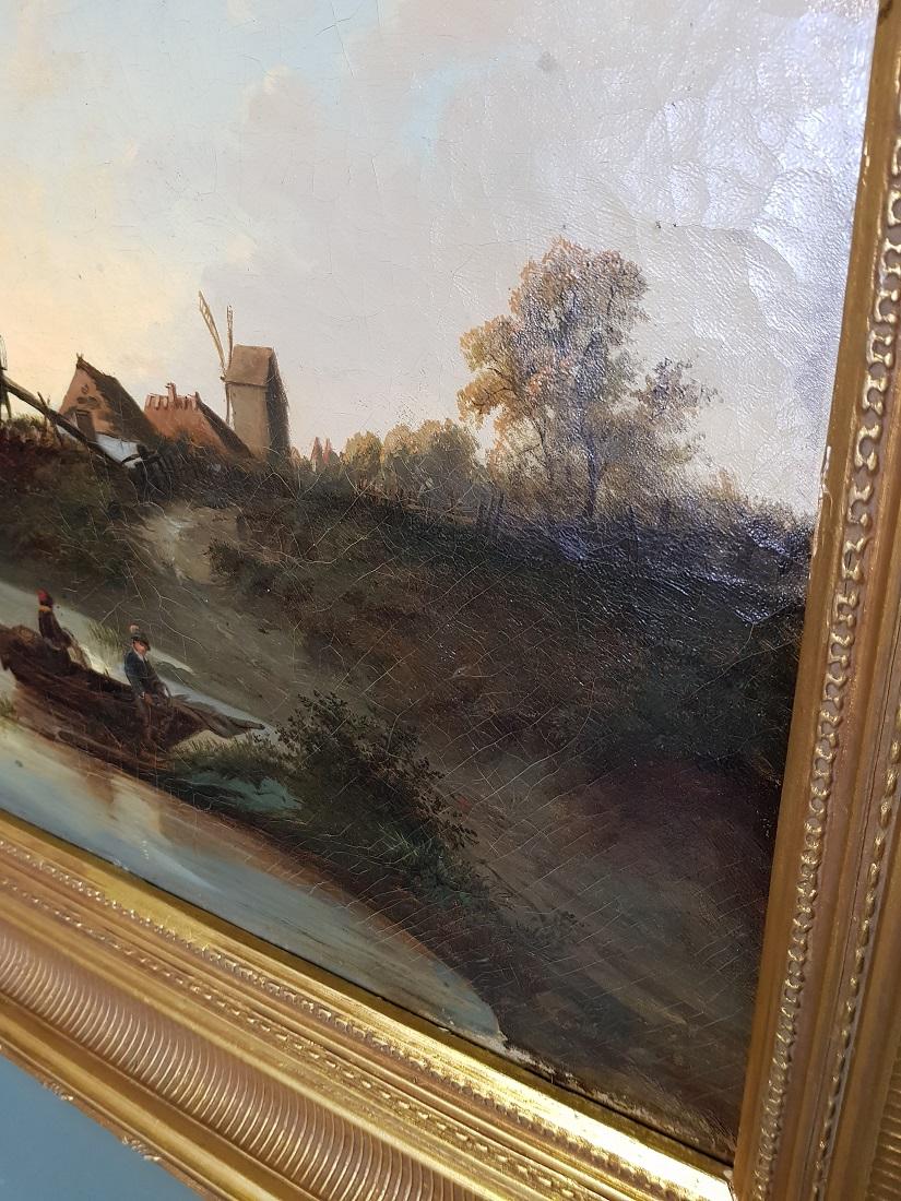 Wood 19th Century Dutch School Oil Painting with Landscape of Fishermen Near a Mill For Sale