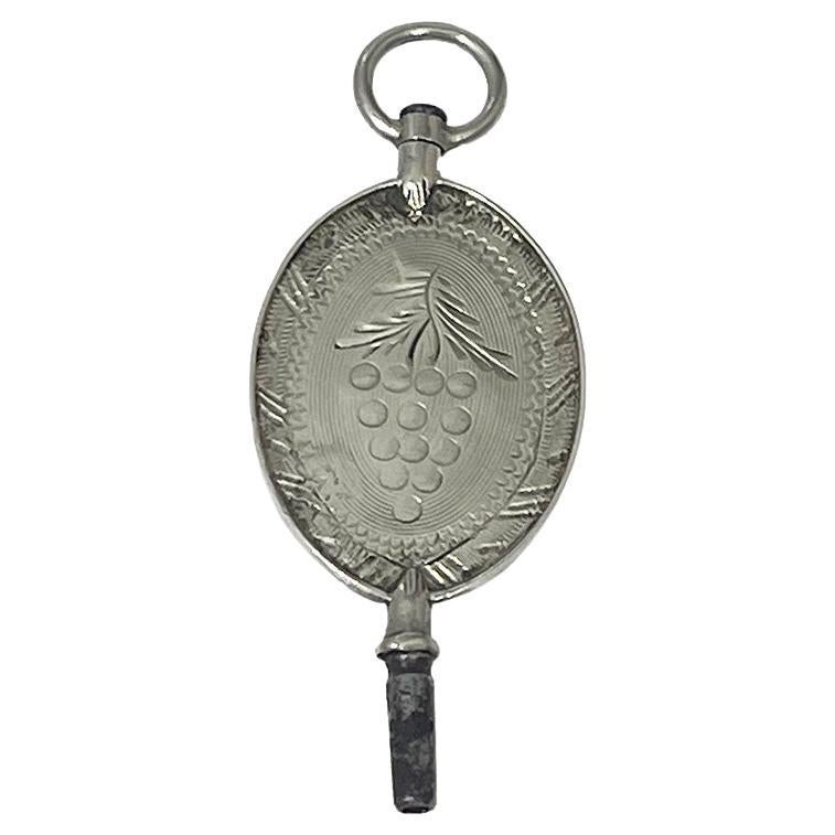 19th Century Dutch silver watch-key with a scene of a bunch of grapes