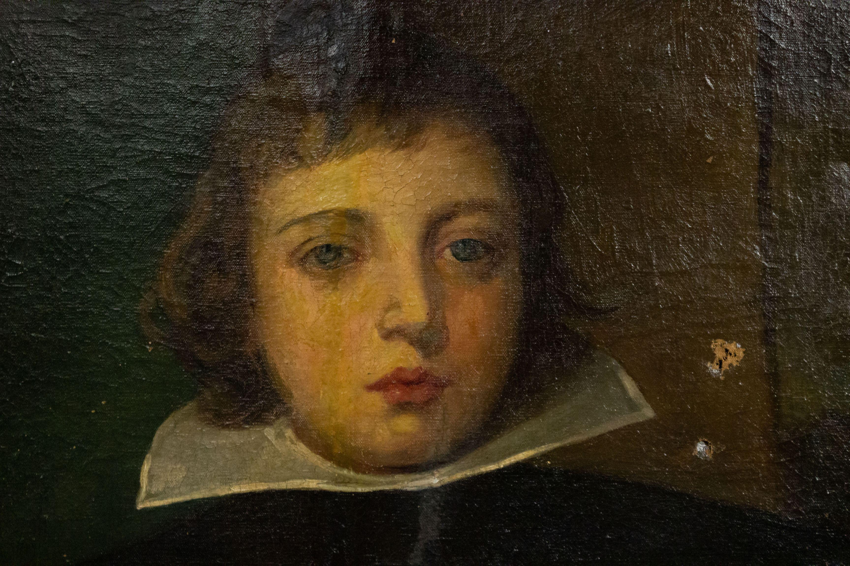 Portrait à l'huile de style hollandais (XIXe siècle) d'un garçon sur un fond blanc et vert dans un cadre ébène (copie Van Dyke, collection Caruso). 
 