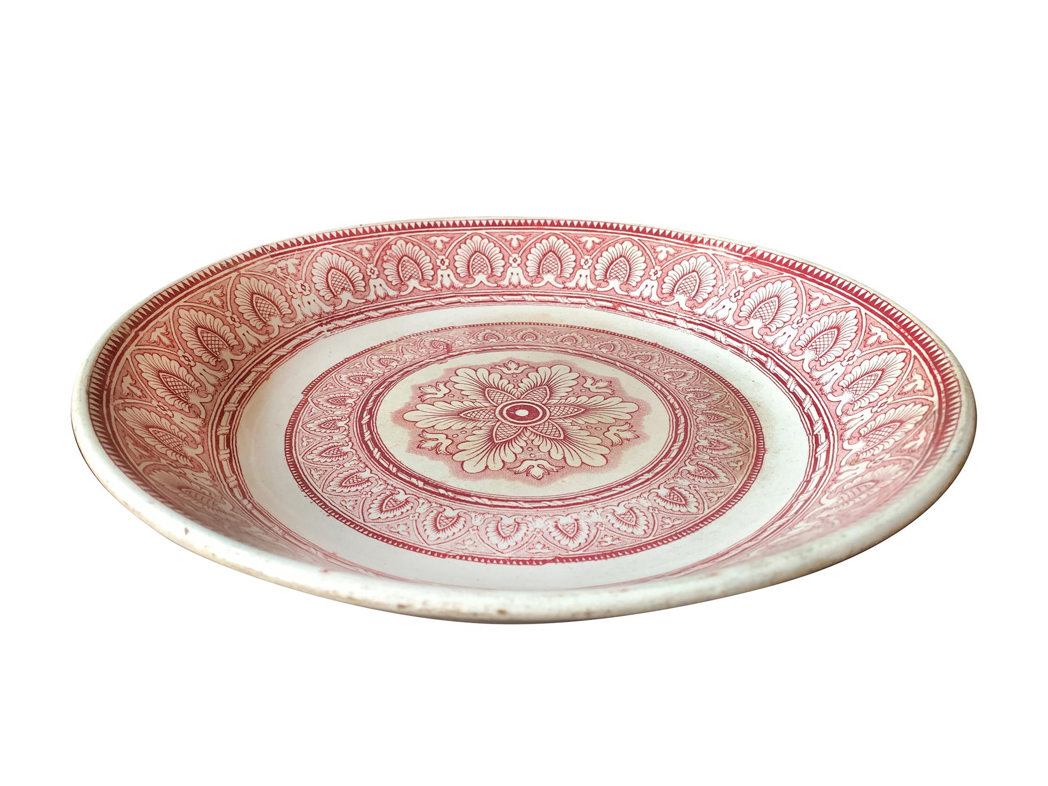 Dutch transferware ceramic bowl, crafted in the 19th century by Petrus Regout & Co. in Maastricht. It features a rich floral design in a maroon tone.

Dimensions:
14.25 in. diameter
2.5 in. height

Condition notes:
In good condition with wear
