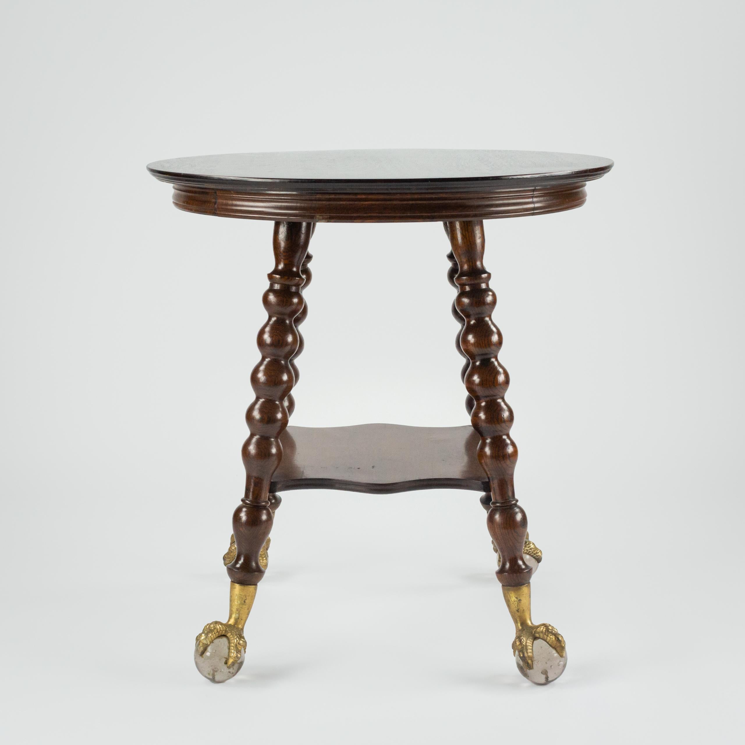19th Century Quarter Sawn Oak Centre Table on very large Brass and Glass Claw Feet.
Excellent Patina.
 USA, Circa 1890.